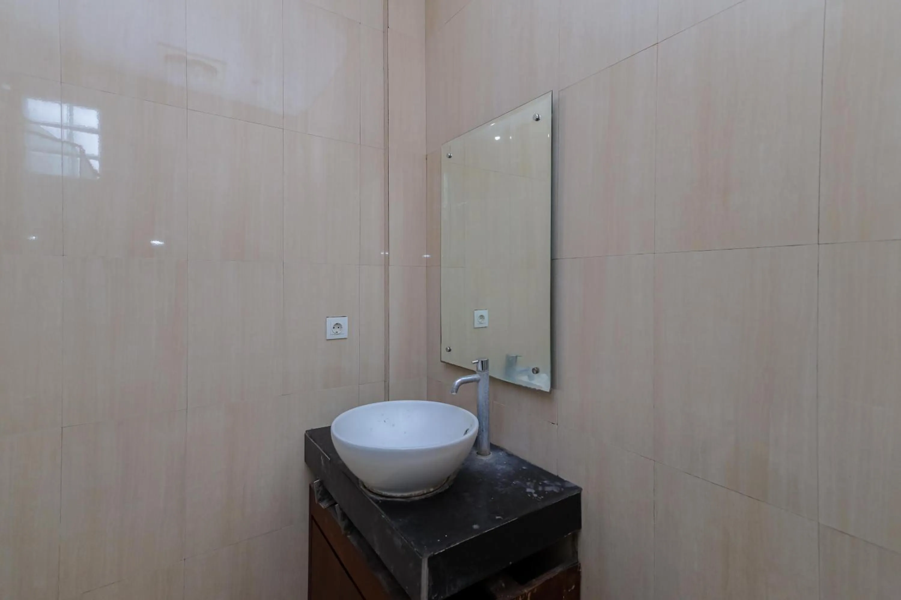 Bathroom in Urbanview Hotel WG Jimbaran Bali