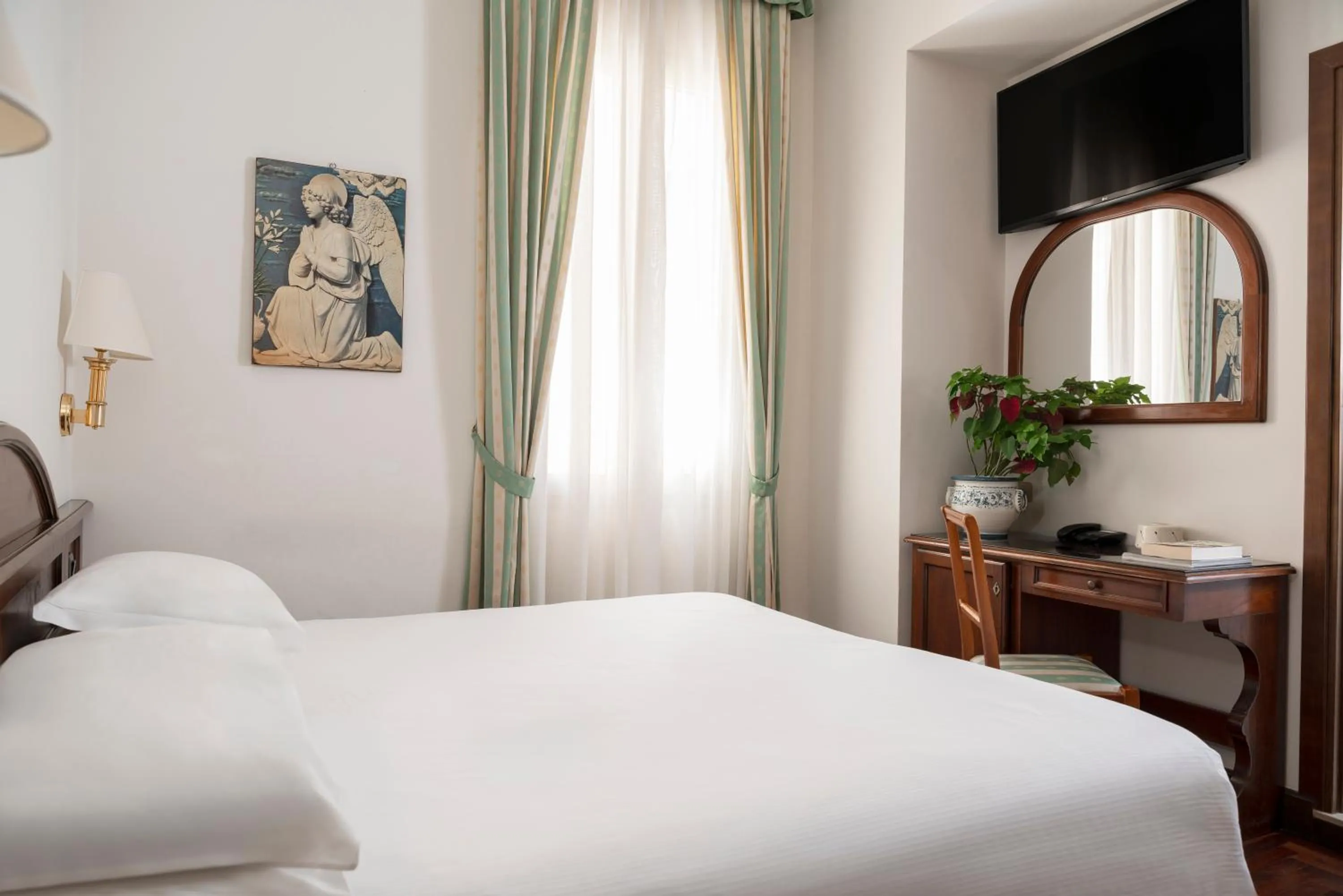 Bed in Hotel Boccaccio