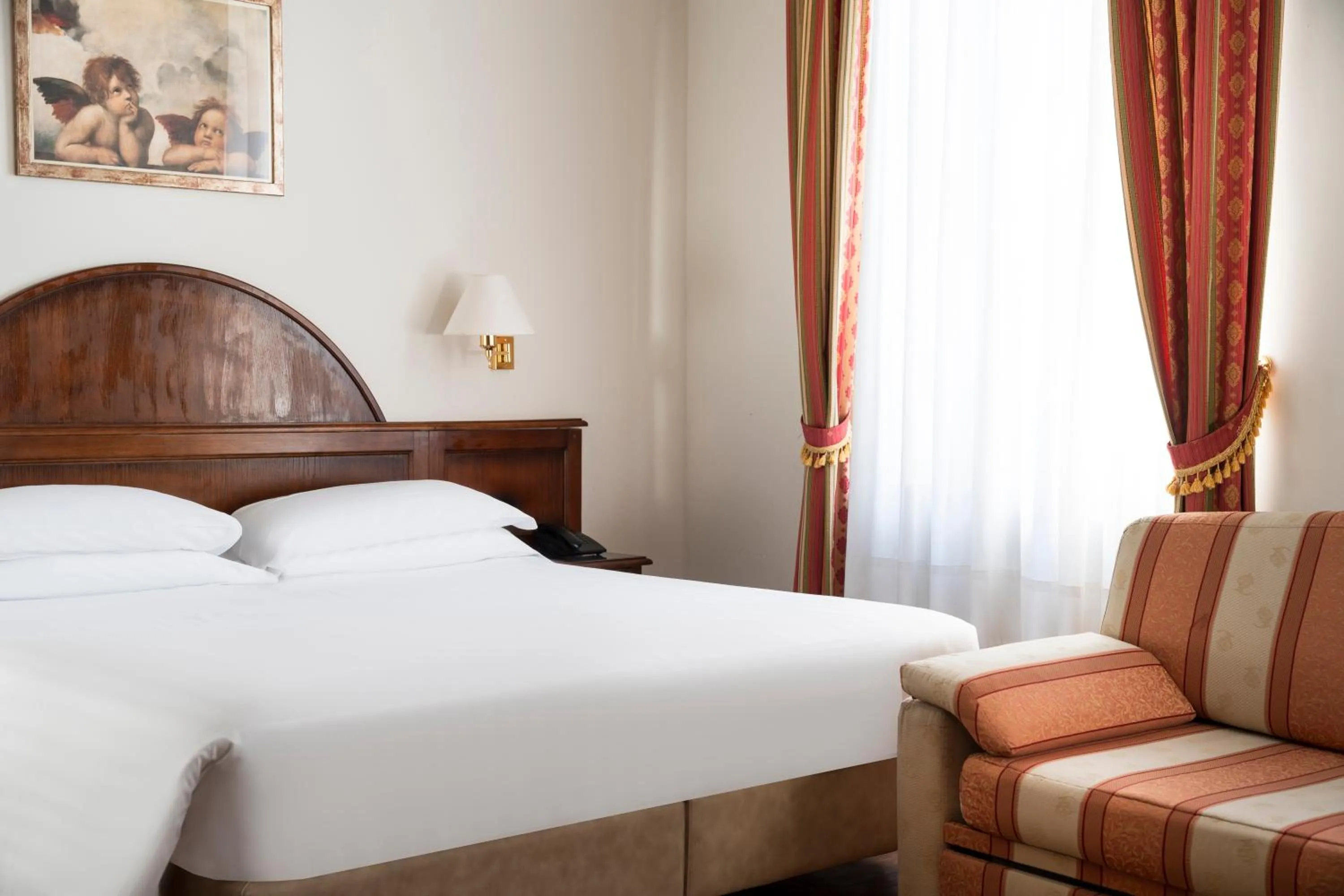 Bed in Hotel Boccaccio