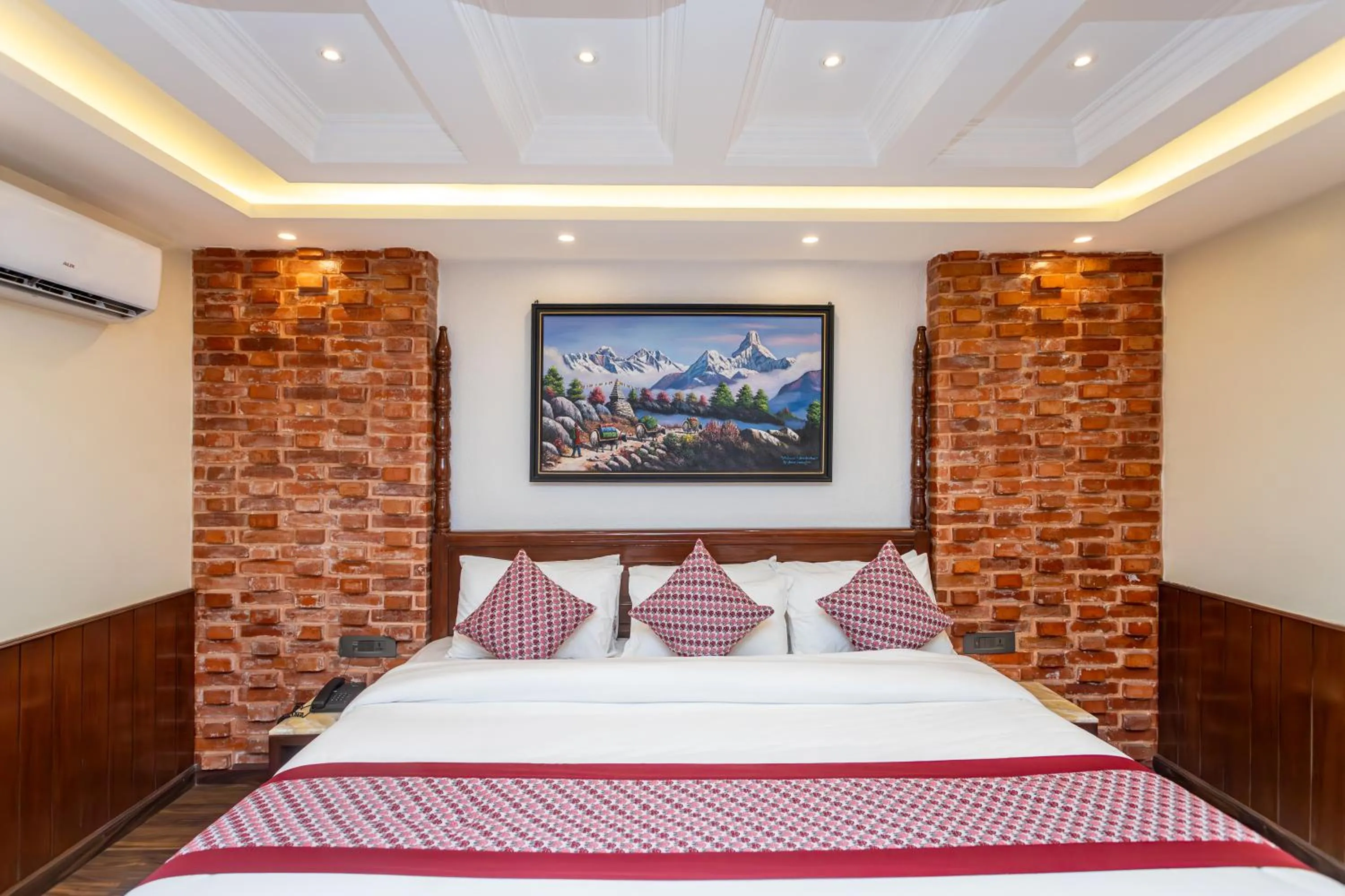 Bed in Amarawati Boutique Hotel