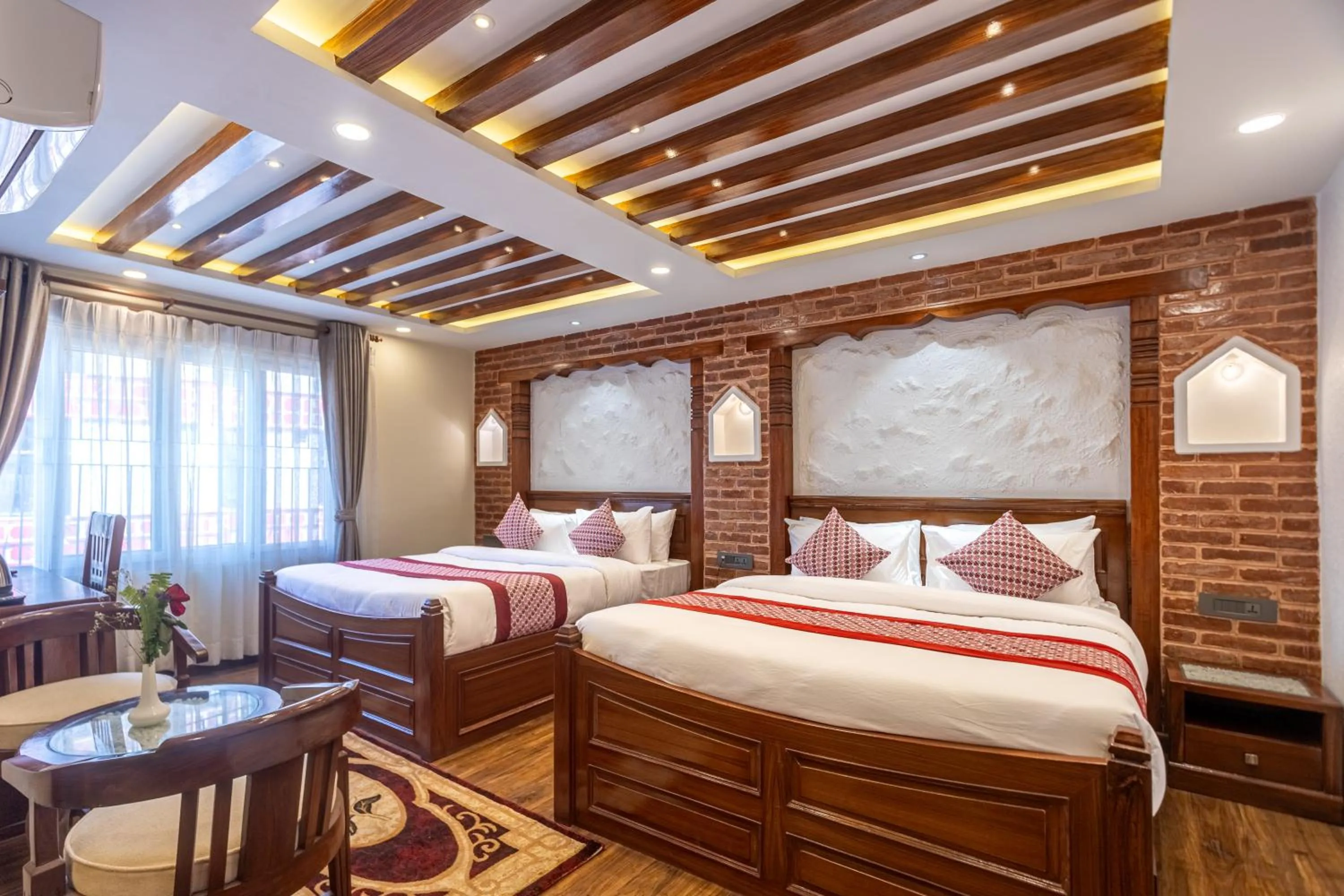 Bed in Amarawati Boutique Hotel
