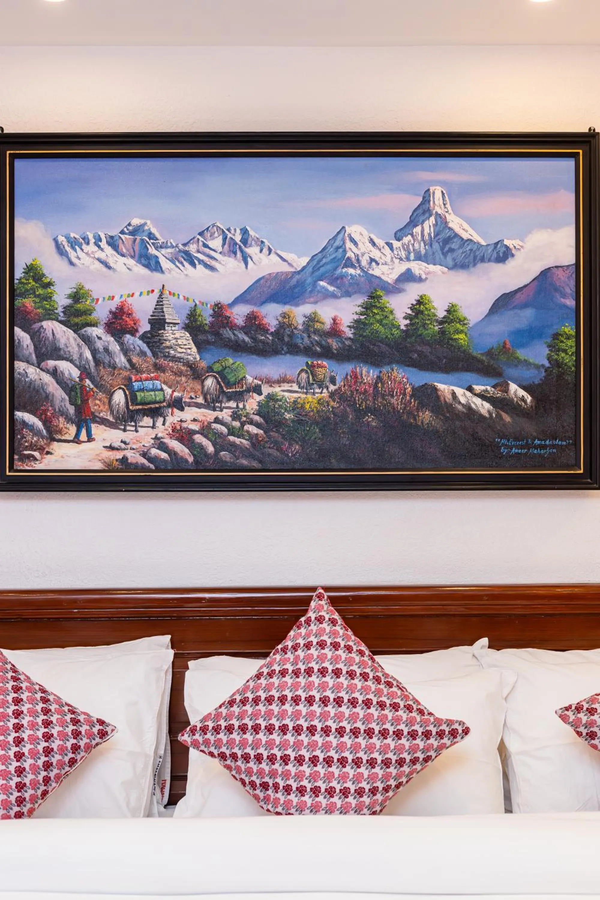 Bed in Amarawati Boutique Hotel