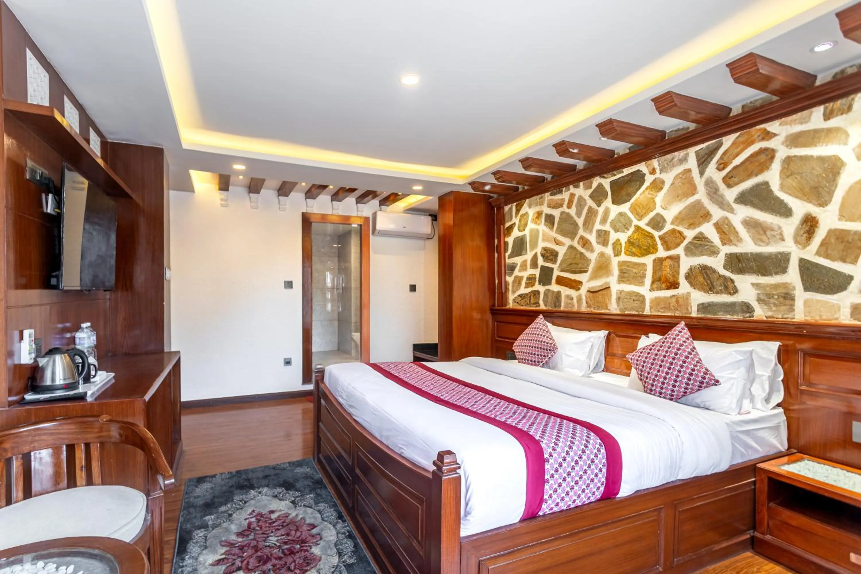 Bed in Amarawati Boutique Hotel