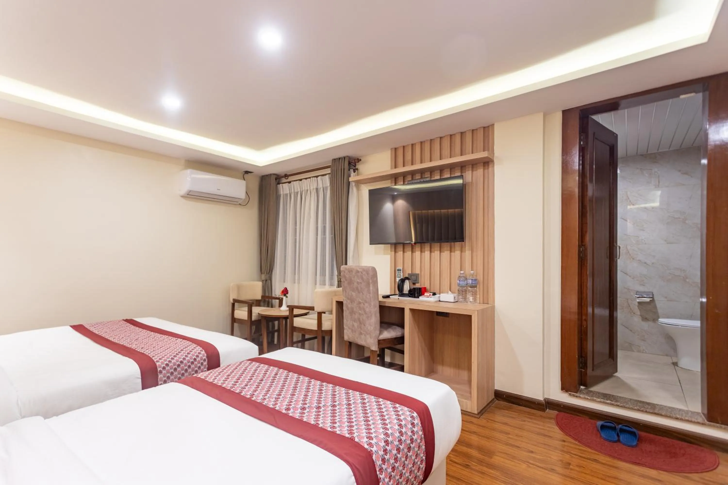 Bed in Amarawati Boutique Hotel