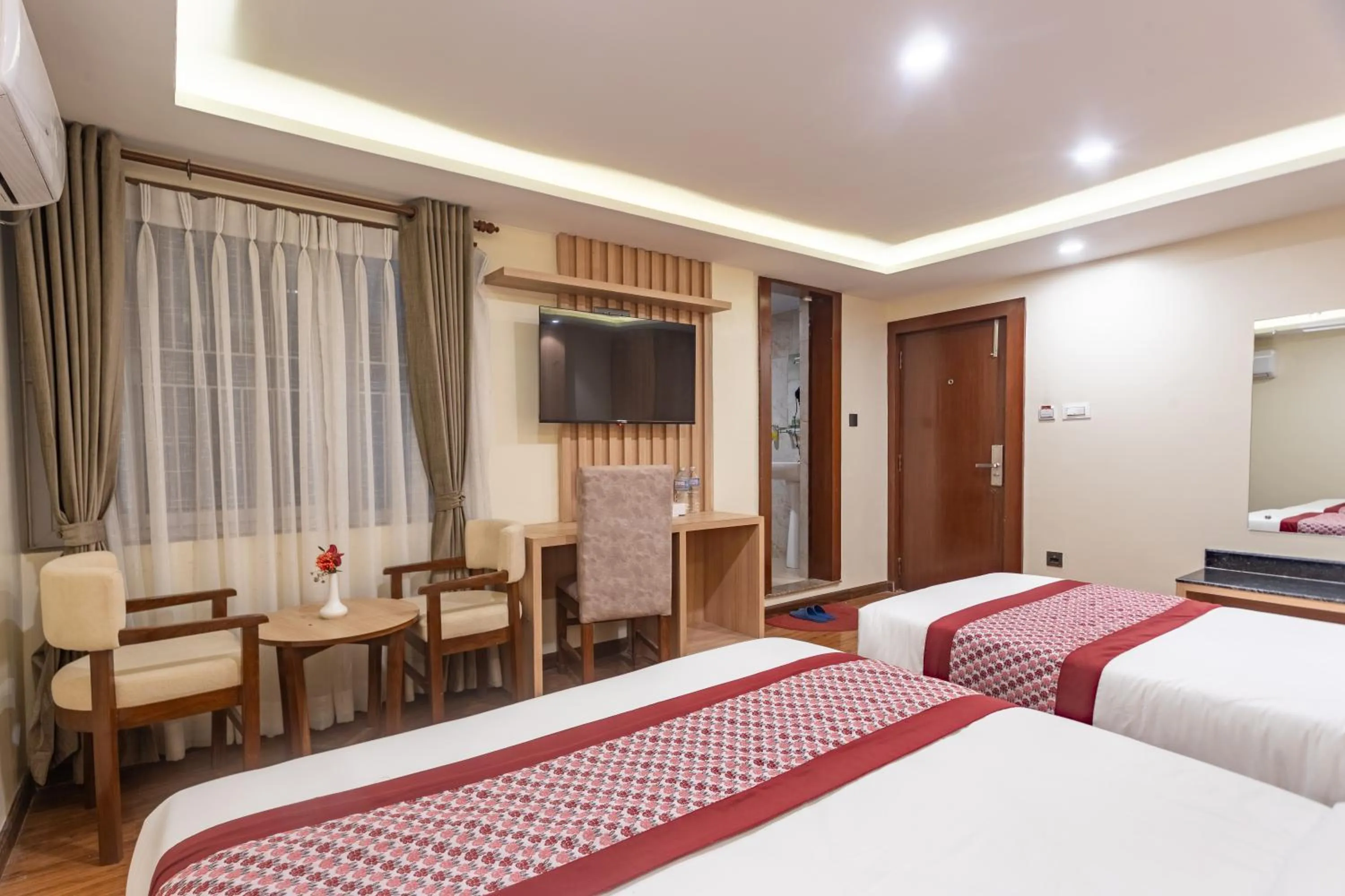 Bed in Amarawati Boutique Hotel