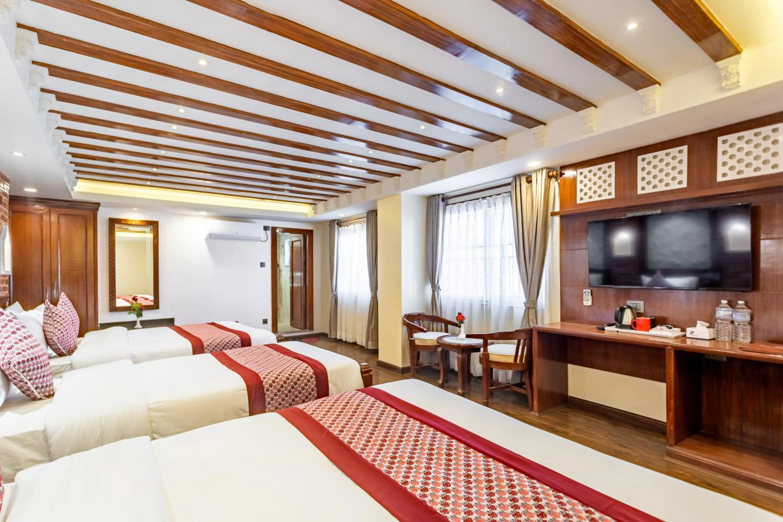 Bed in Amarawati Boutique Hotel