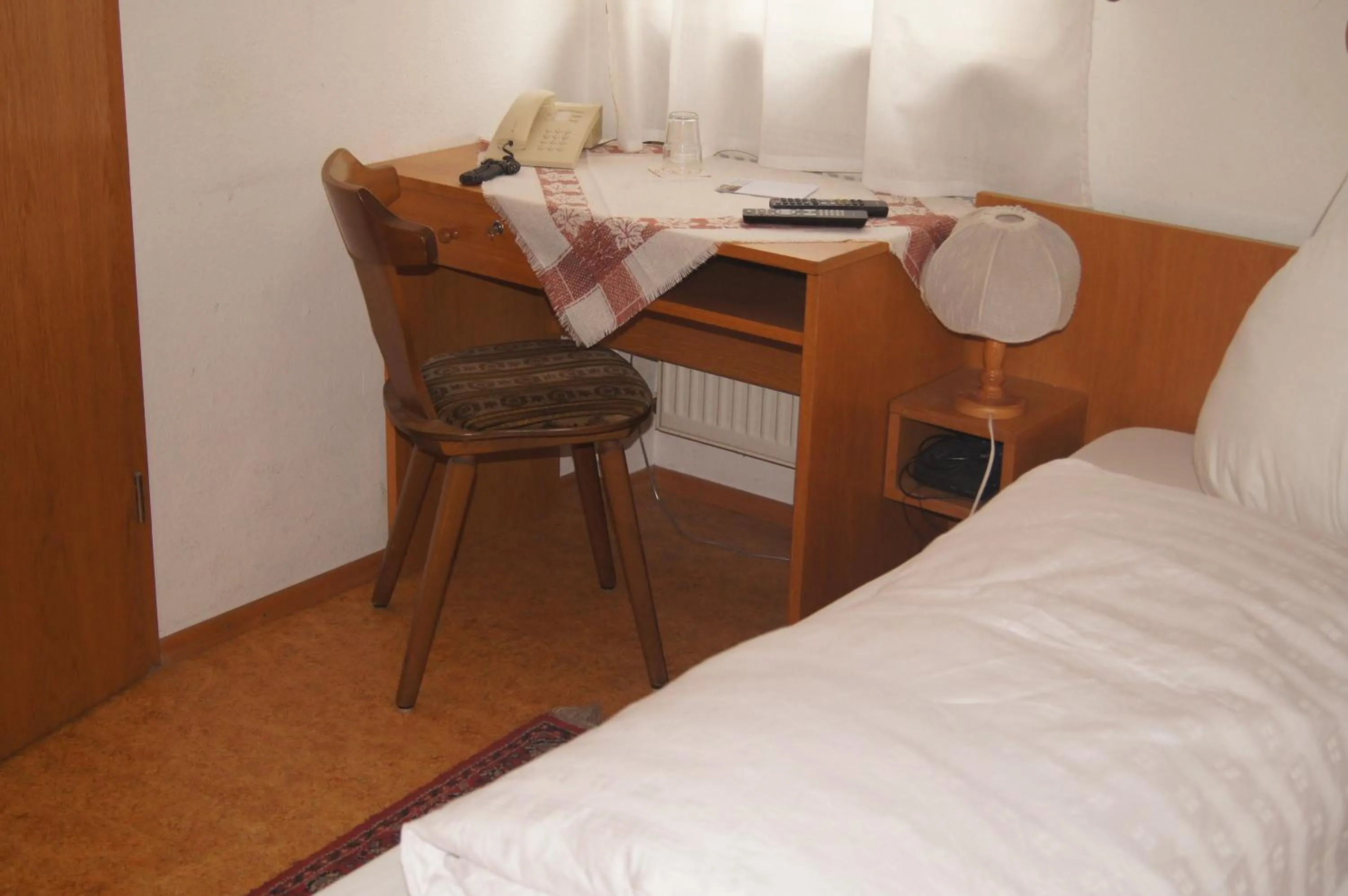 Seating area, Bed in Hotel Krone