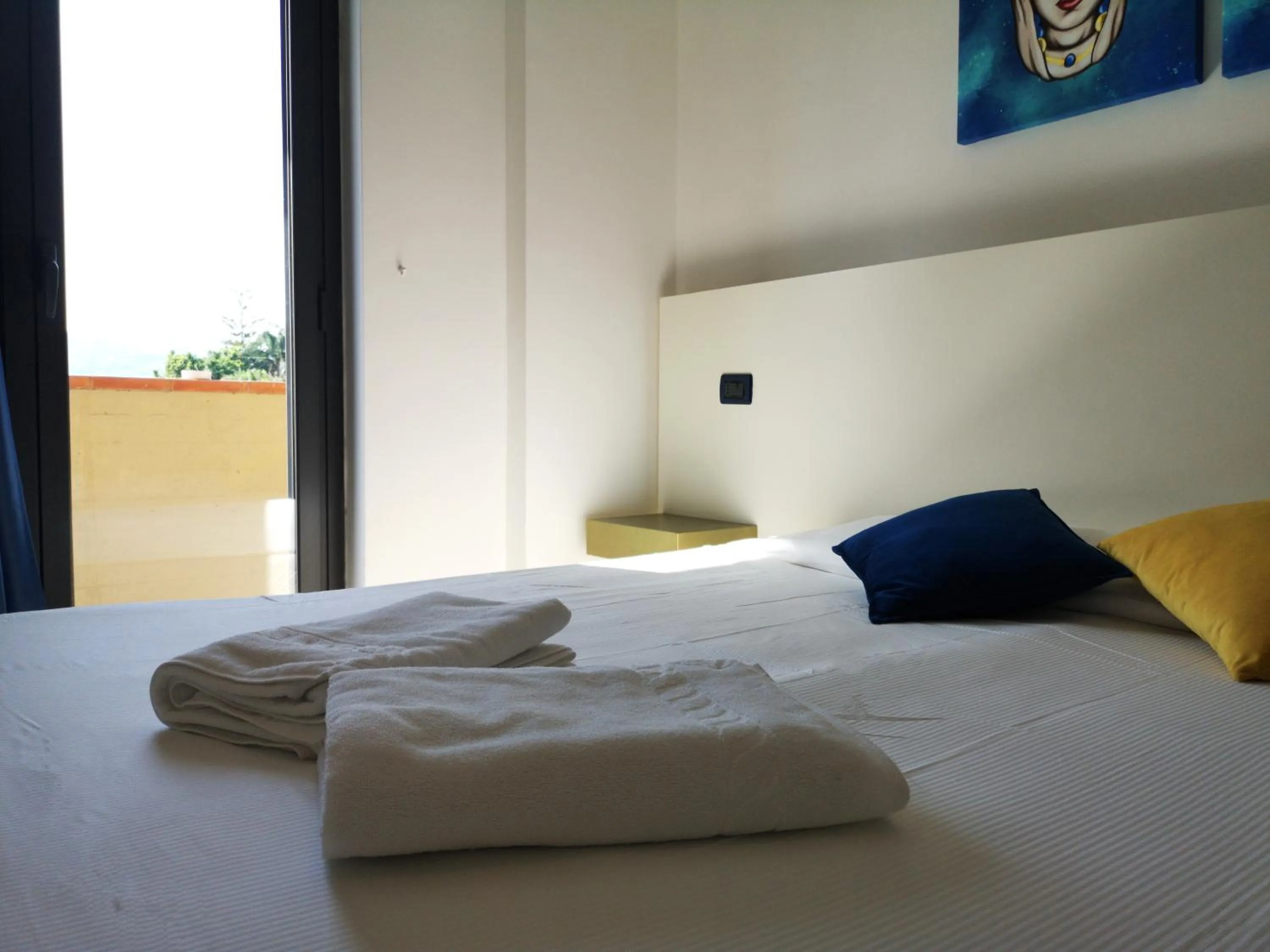 Bed in Oasi Park Hotel