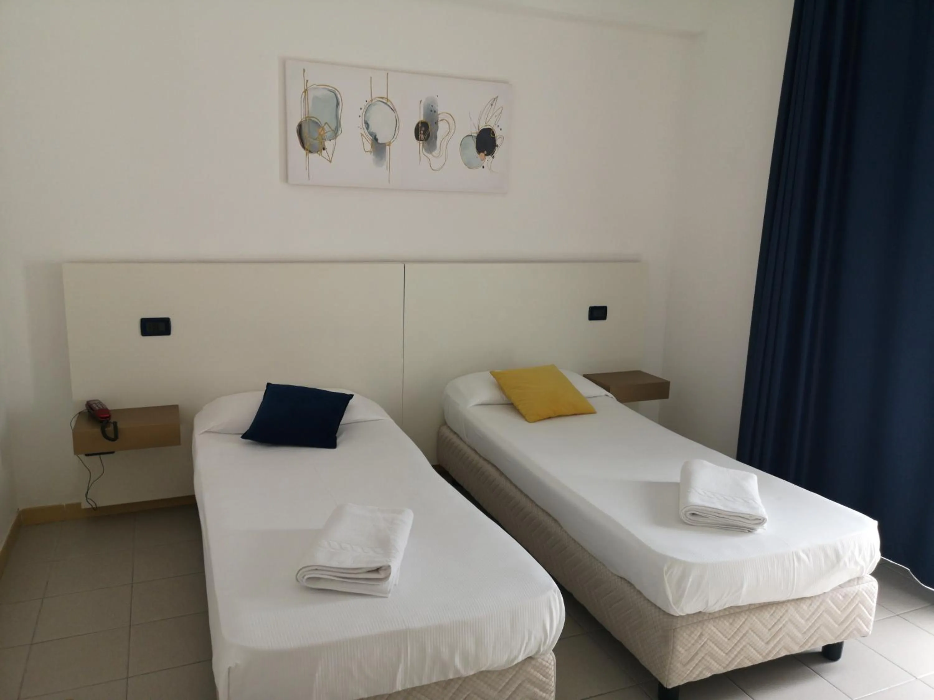 Bed in Oasi Park Hotel