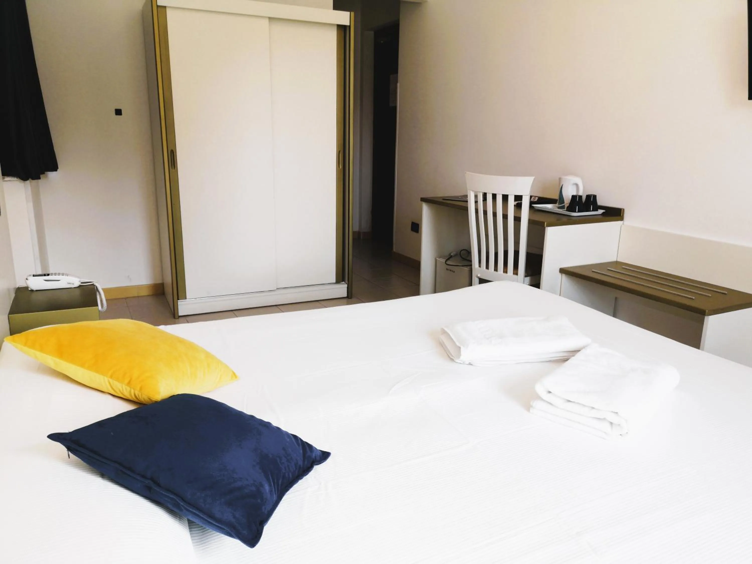 Bed in Oasi Park Hotel