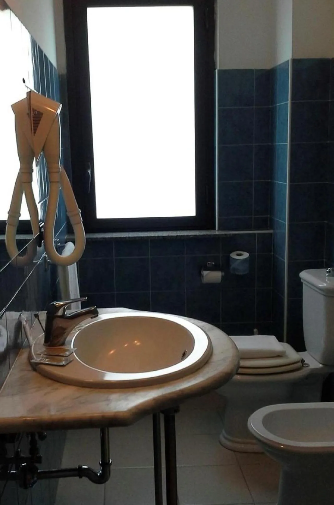 Bathroom in Oasi Park Hotel