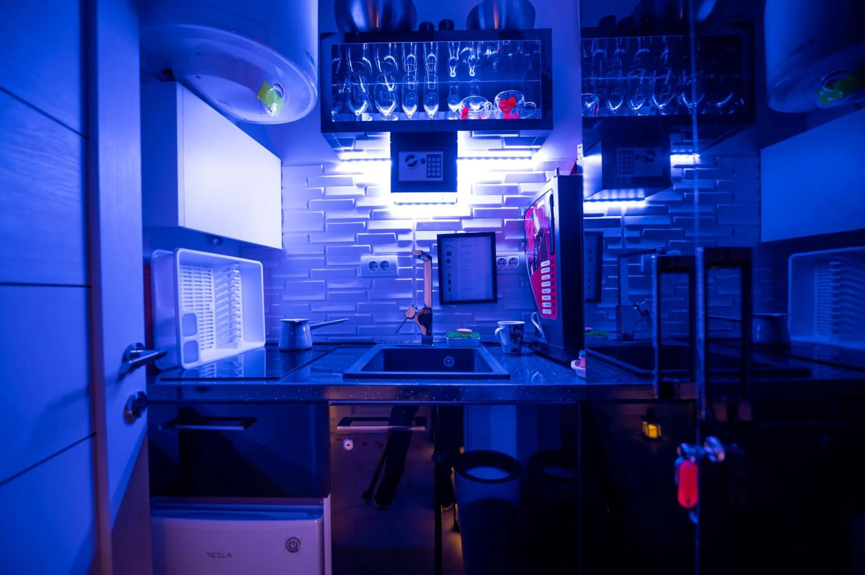 Kitchen or kitchenette in Aurora Lux Spa Smart apartments