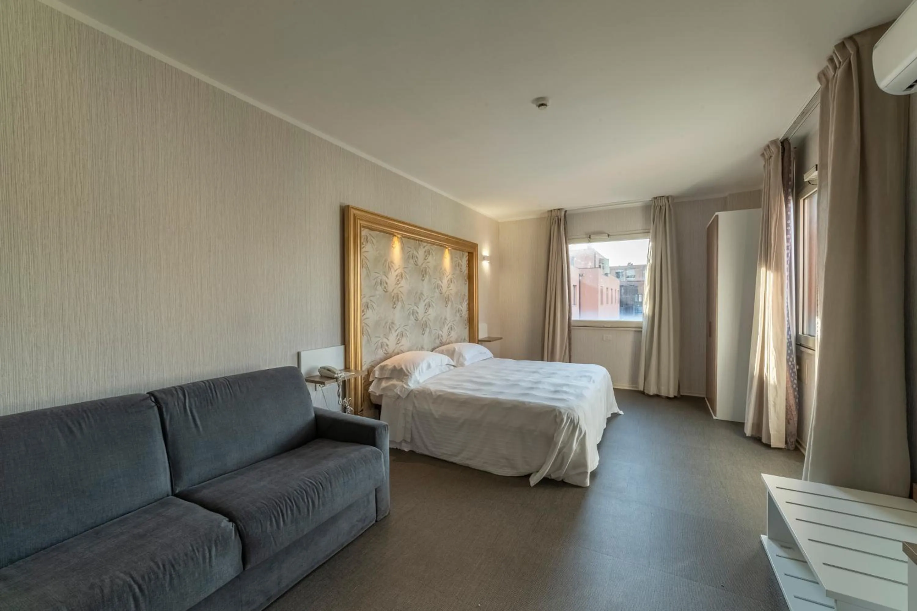 Bed in Hotel Repubblica Marinara