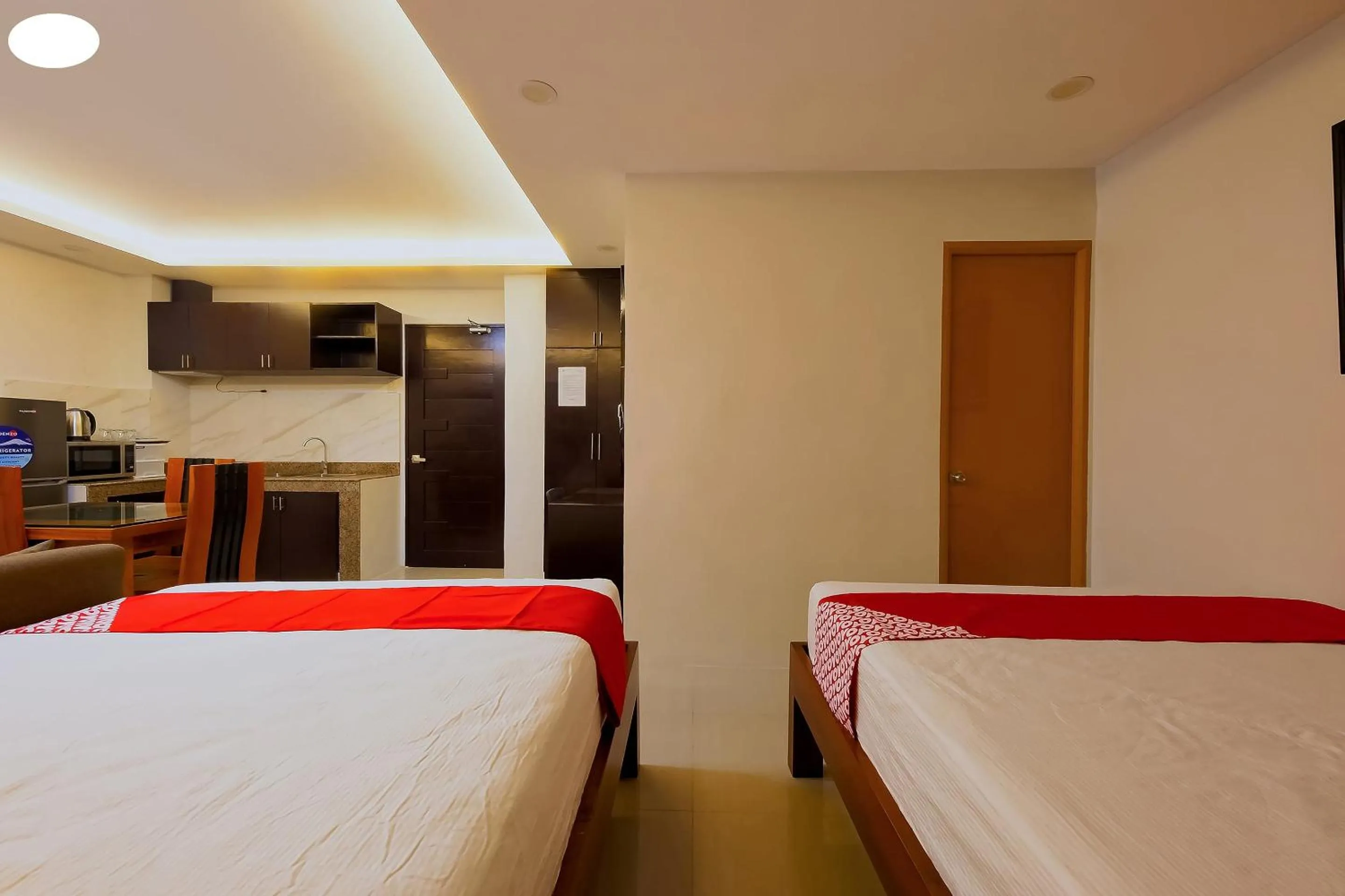 Bedroom in OYO 848 Dona Aurora Condotel