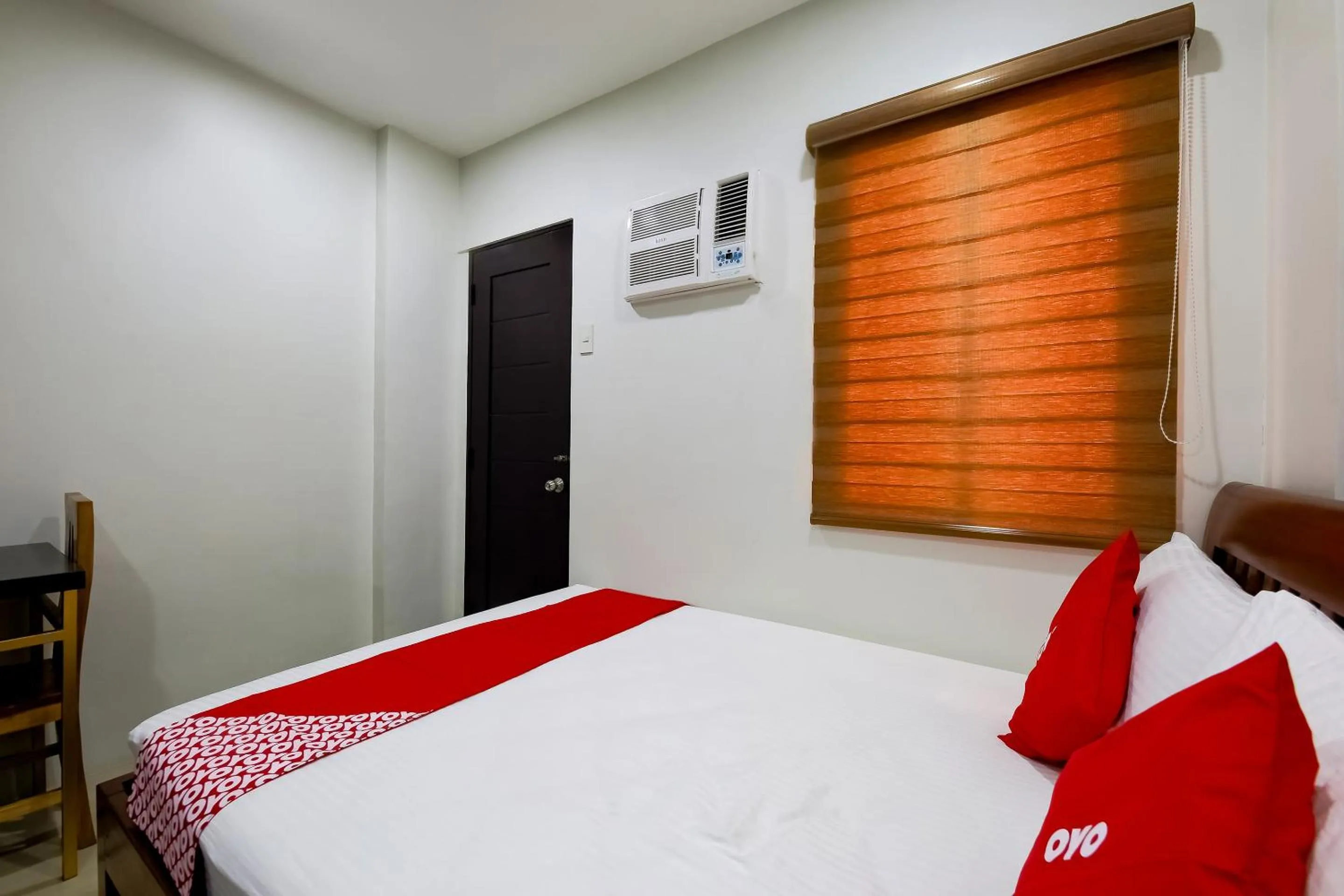 Bedroom in OYO 848 Dona Aurora Condotel