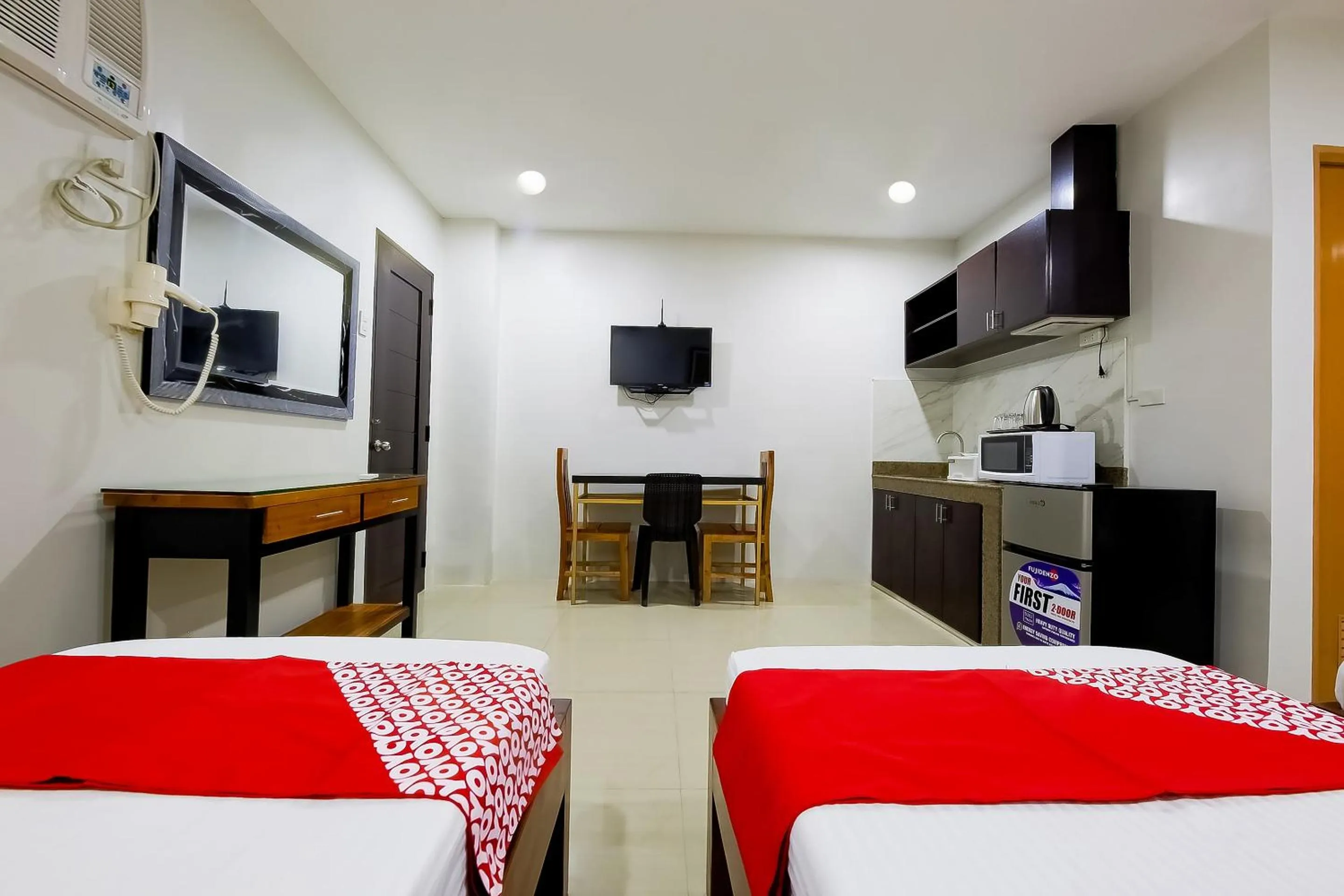 Bedroom in OYO 848 Dona Aurora Condotel