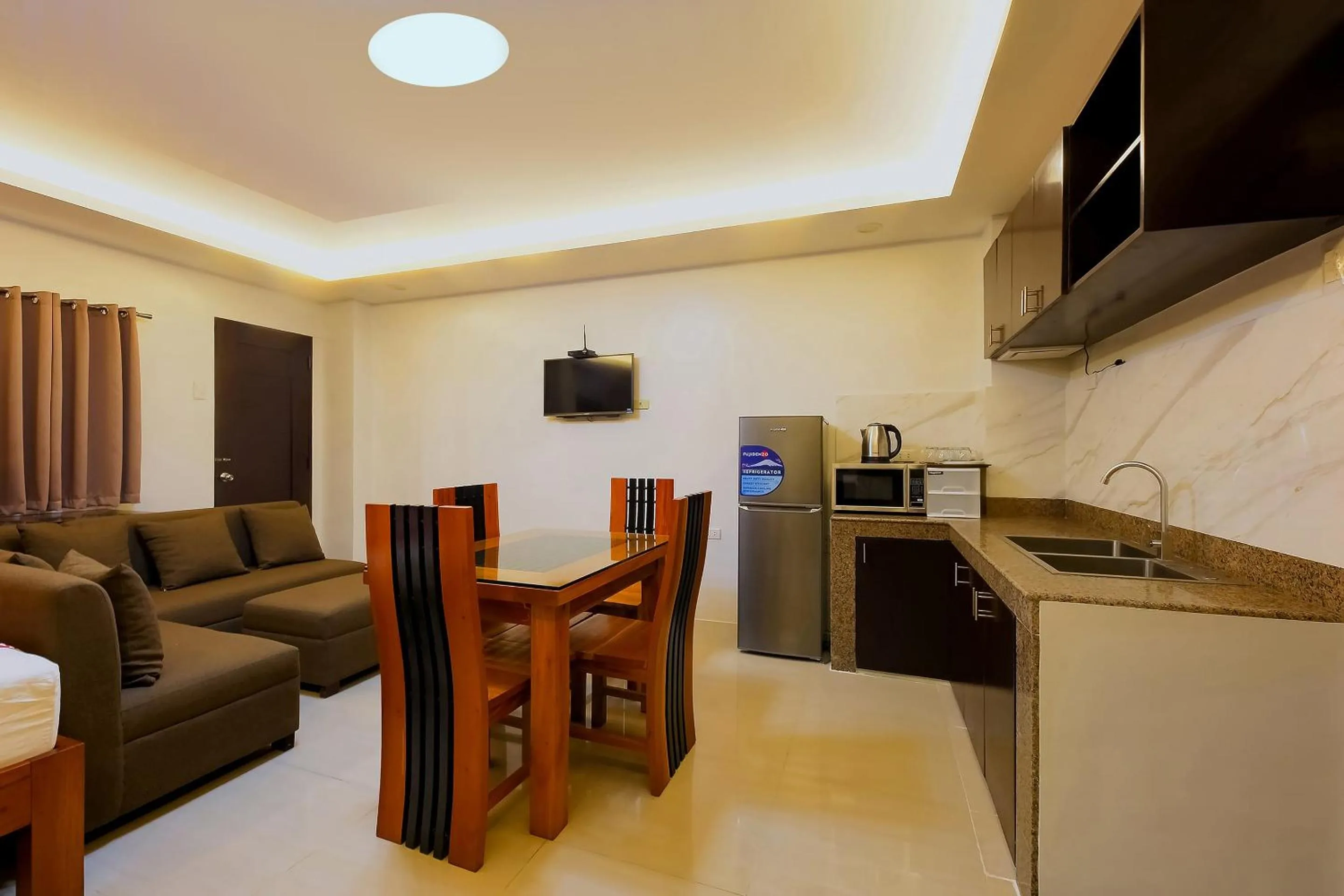 Bedroom in OYO 848 Dona Aurora Condotel