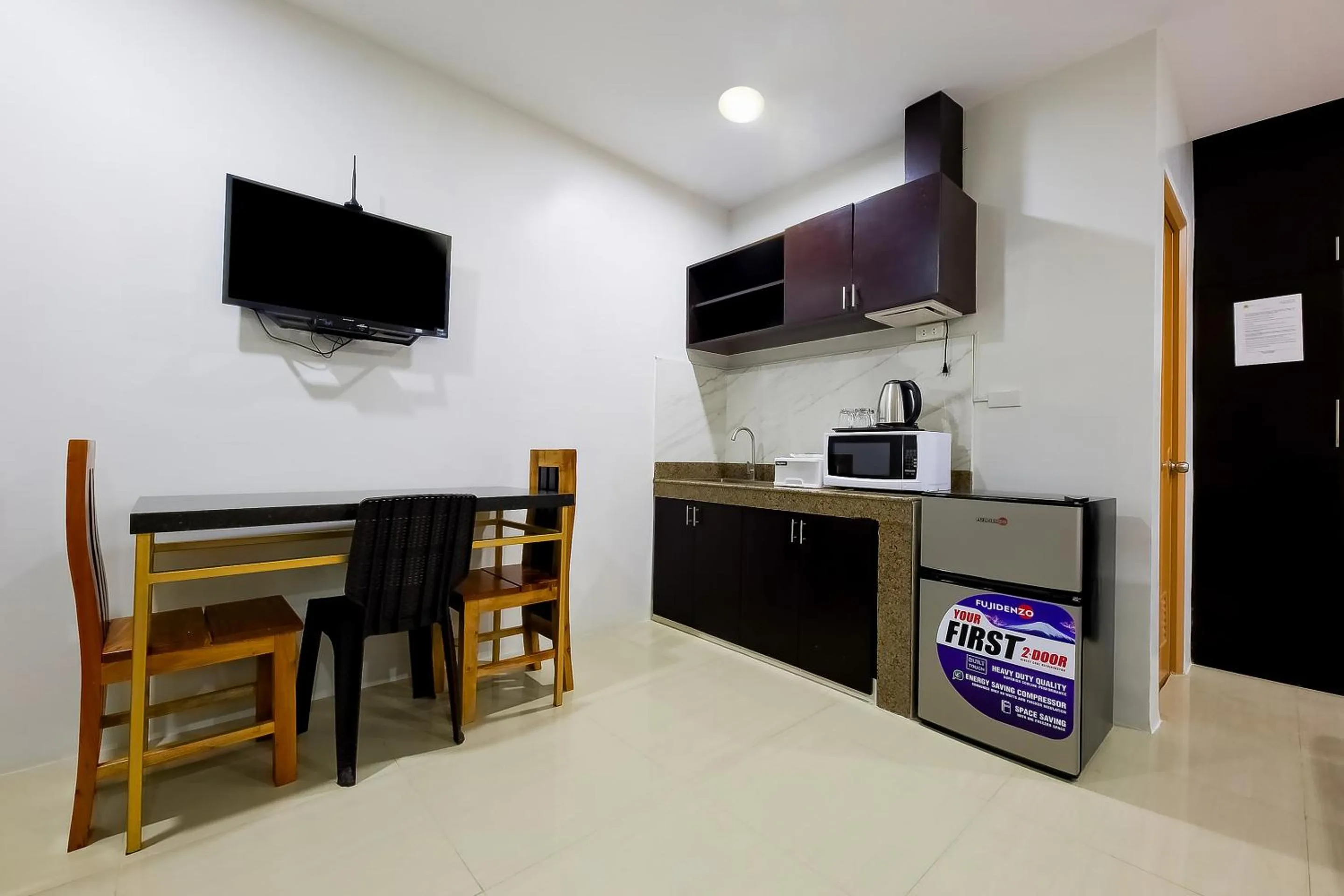 Bedroom in OYO 848 Dona Aurora Condotel