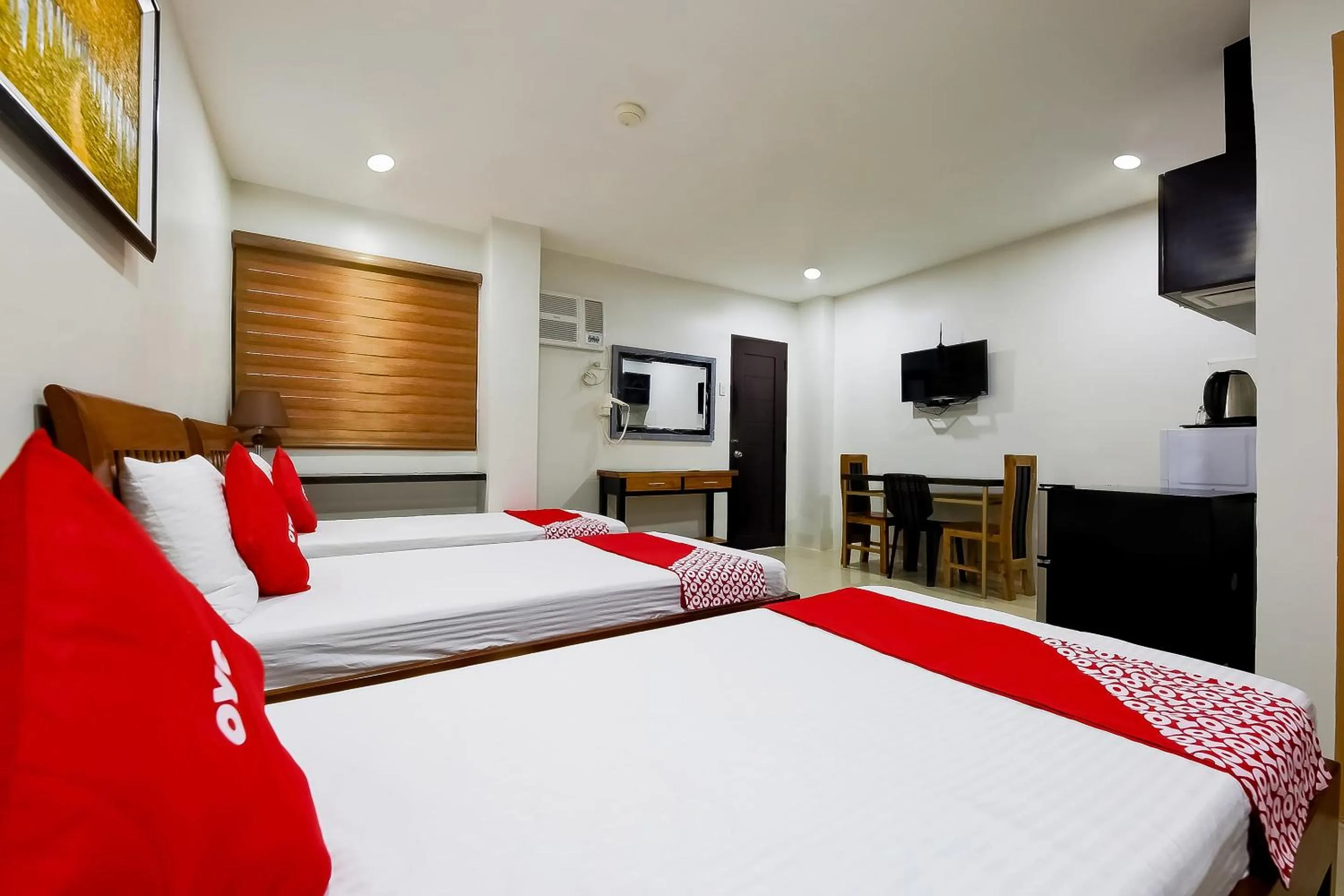 Bedroom in OYO 848 Dona Aurora Condotel