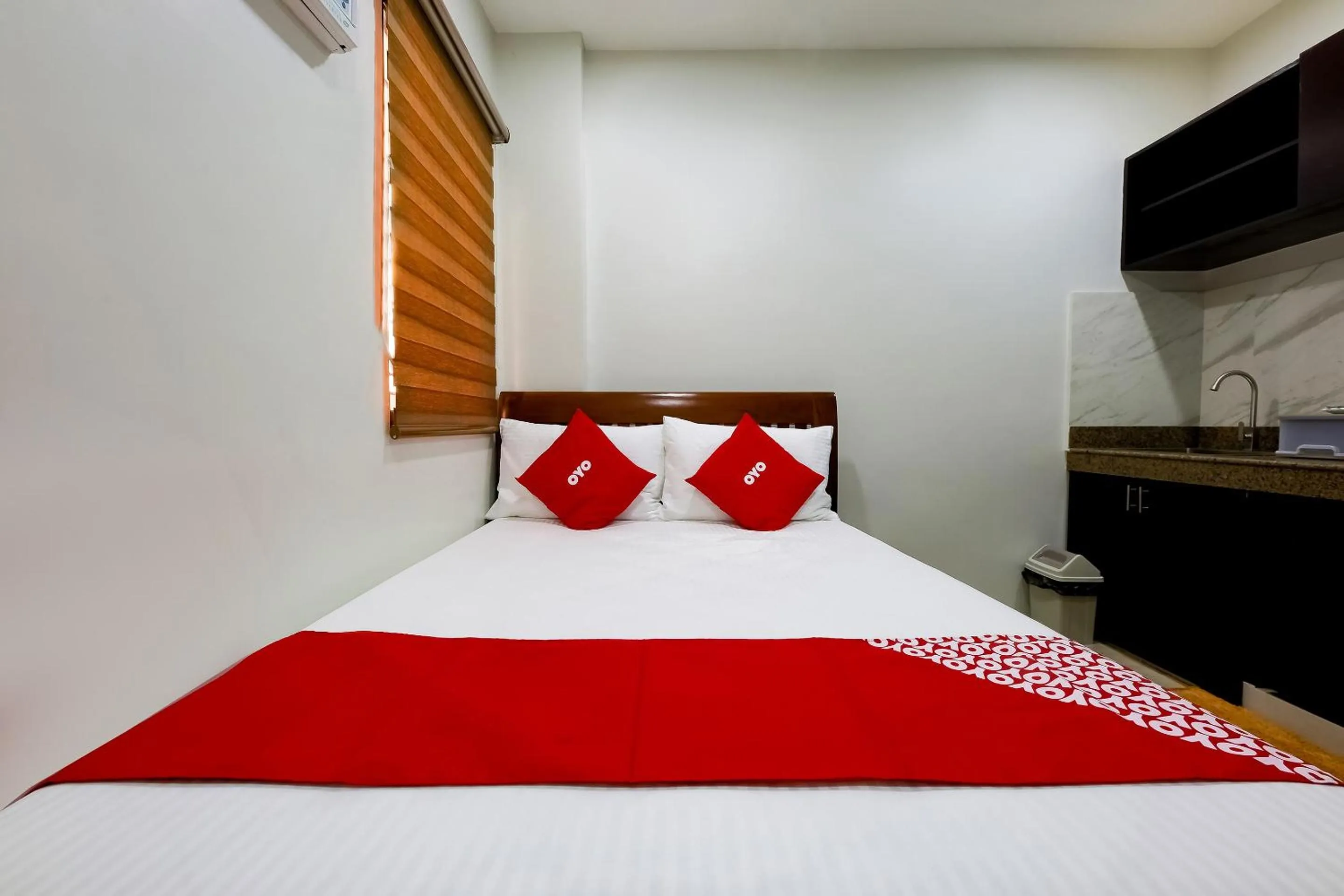 Bedroom in OYO 848 Dona Aurora Condotel