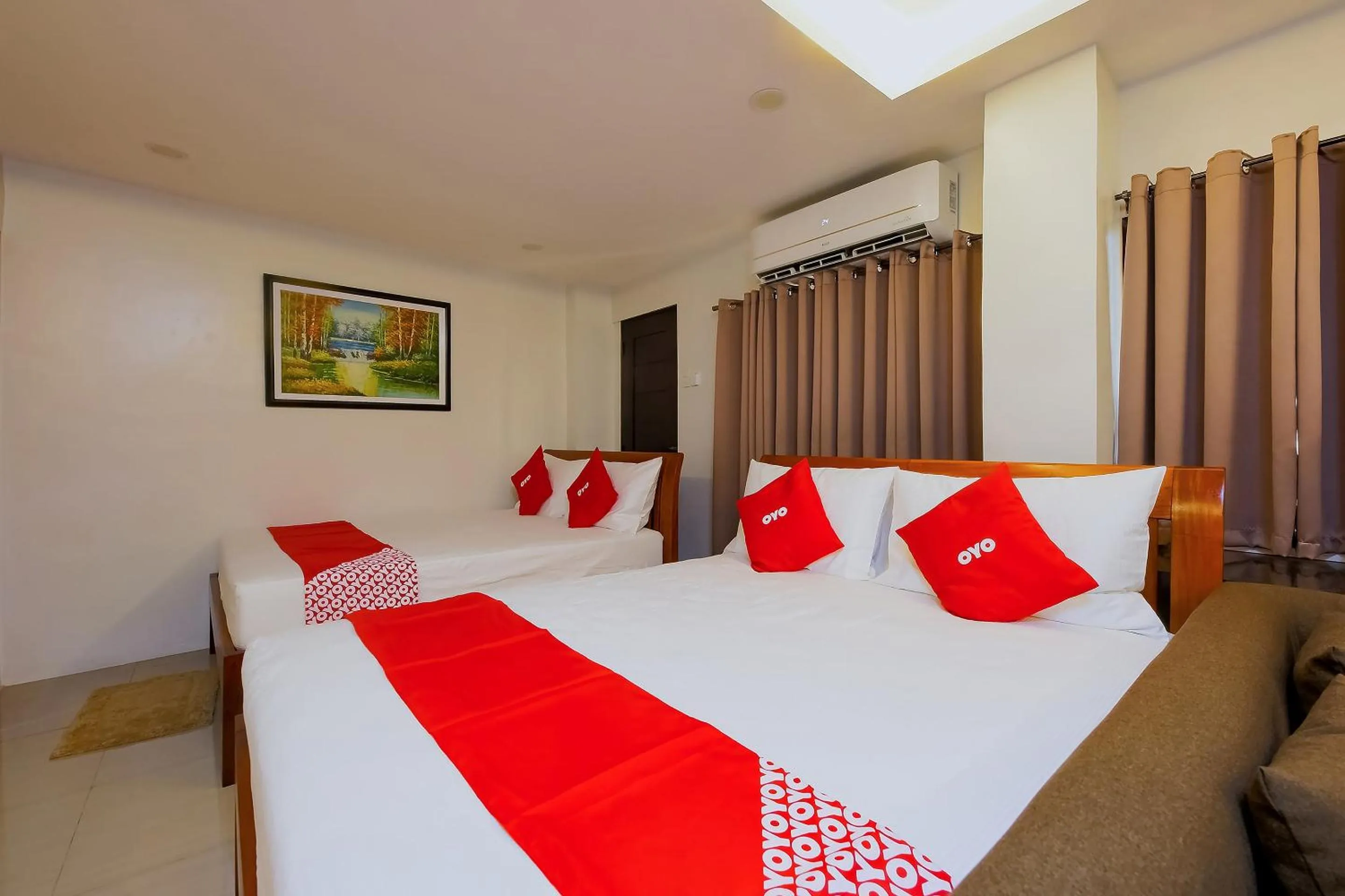 Bedroom in OYO 848 Dona Aurora Condotel