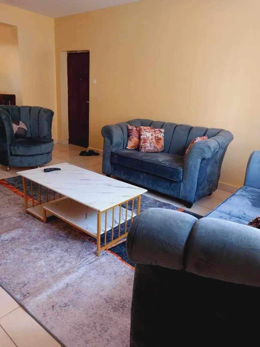 Living room in Lux Suites Honey Dew Stays Athiriver