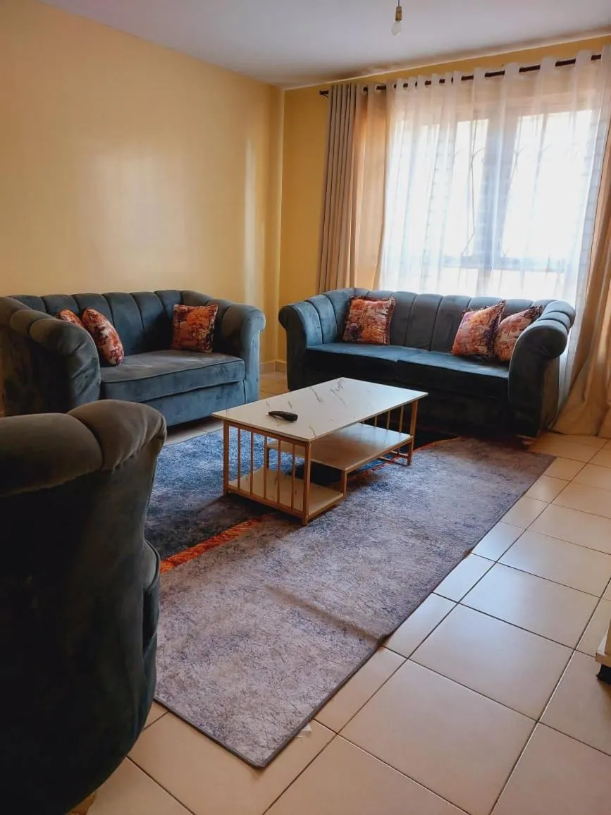 Living room in Lux Suites Honey Dew Stays Athiriver