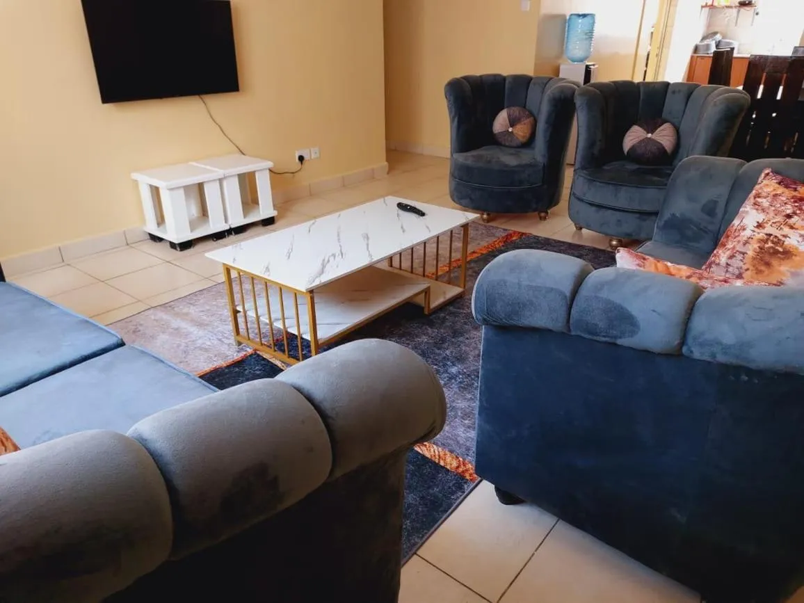 Living room in Lux Suites Honey Dew Stays Athiriver