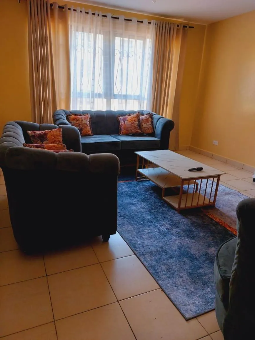 Seating area in Lux Suites Honey Dew Stays Athiriver