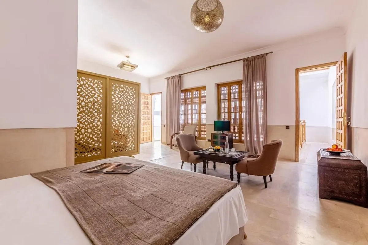 Photo of the whole room, Bed in Riad Kahena