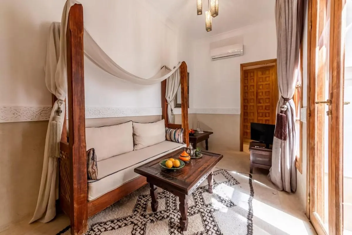 Seating area, Bed in Riad Kahena