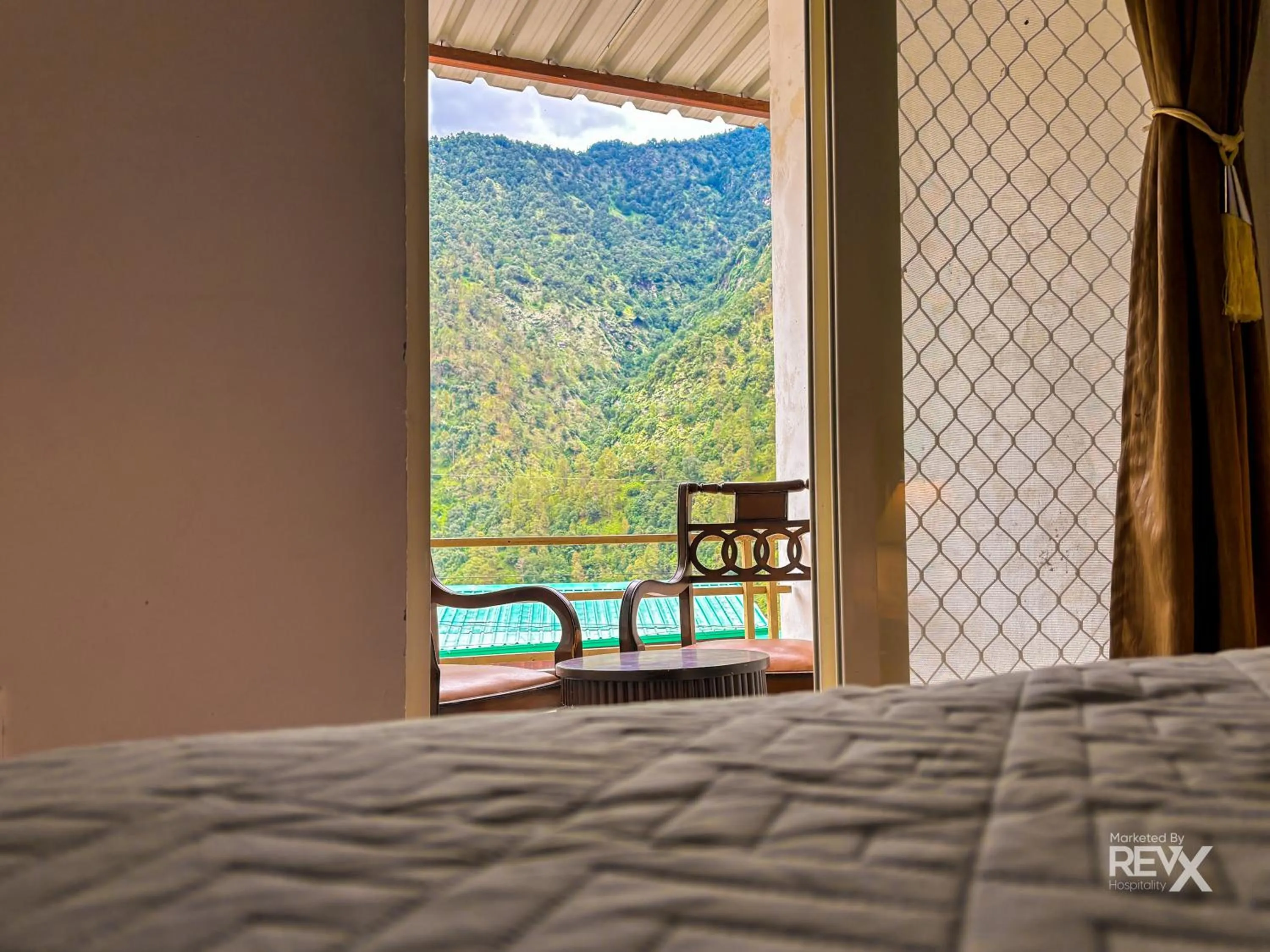 Bed in The Sona Heli Resort