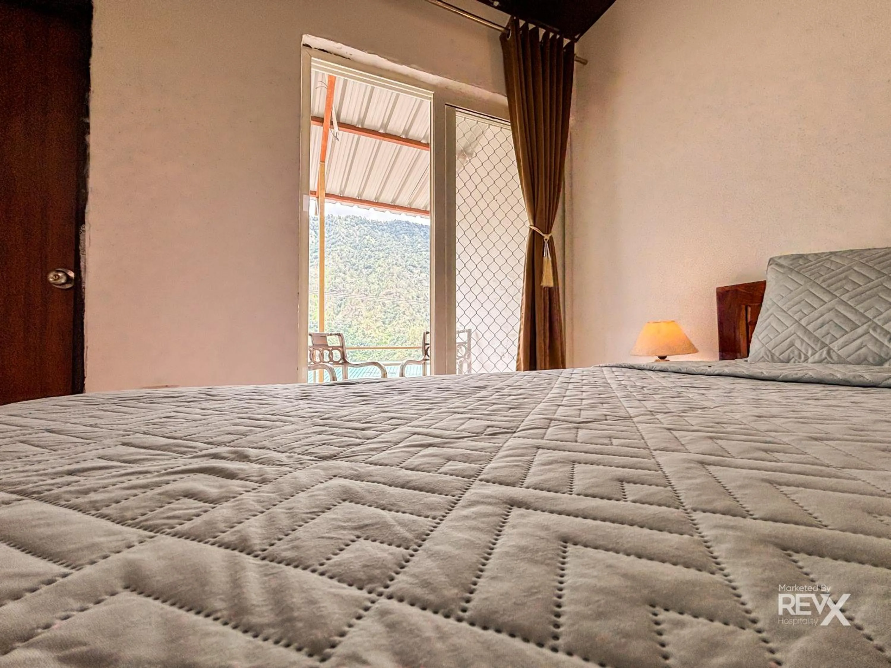 Bed in The Sona Heli Resort