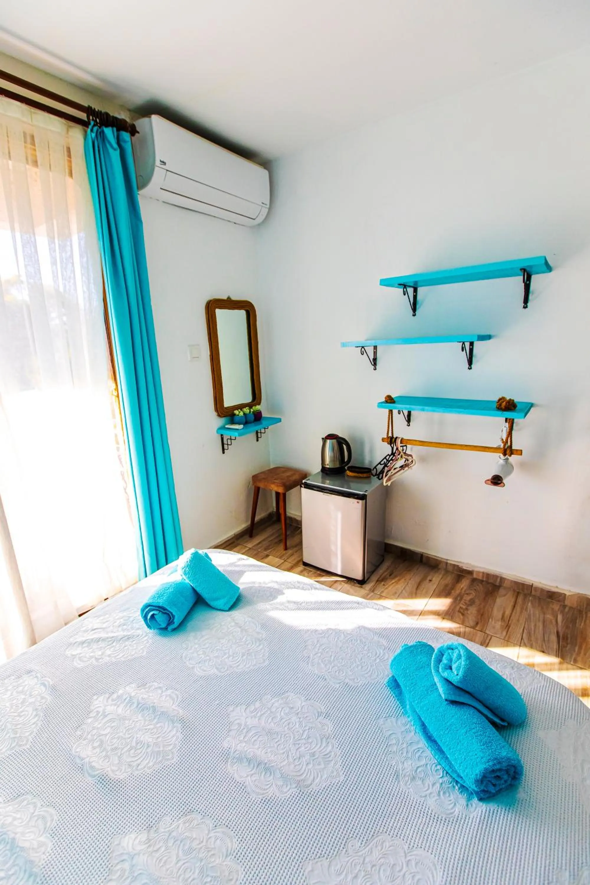 Bed in TUTHALİYA HOTEL