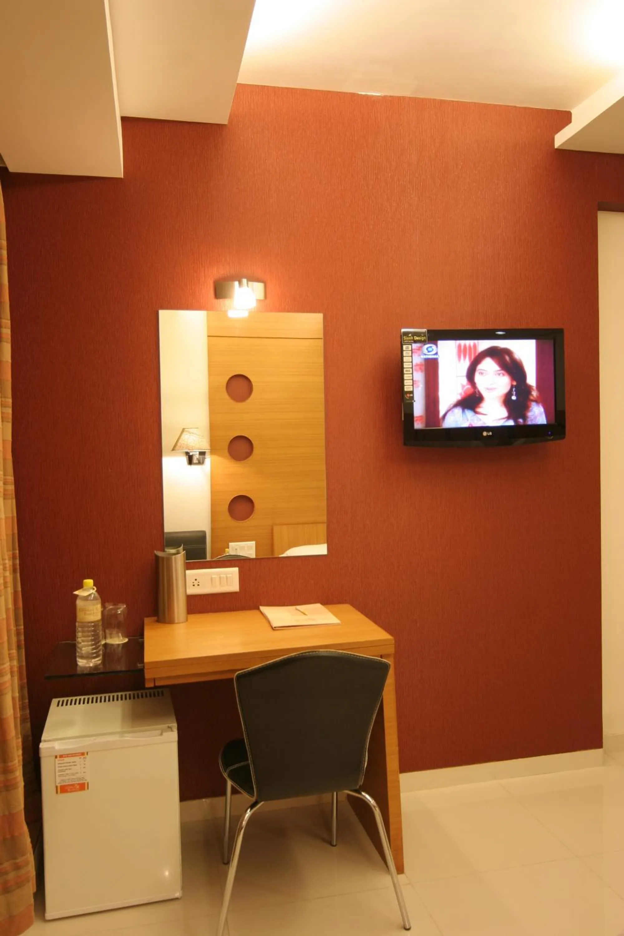 Seating area in Pride Biznotel Alkapuri Near Vadodara Airport