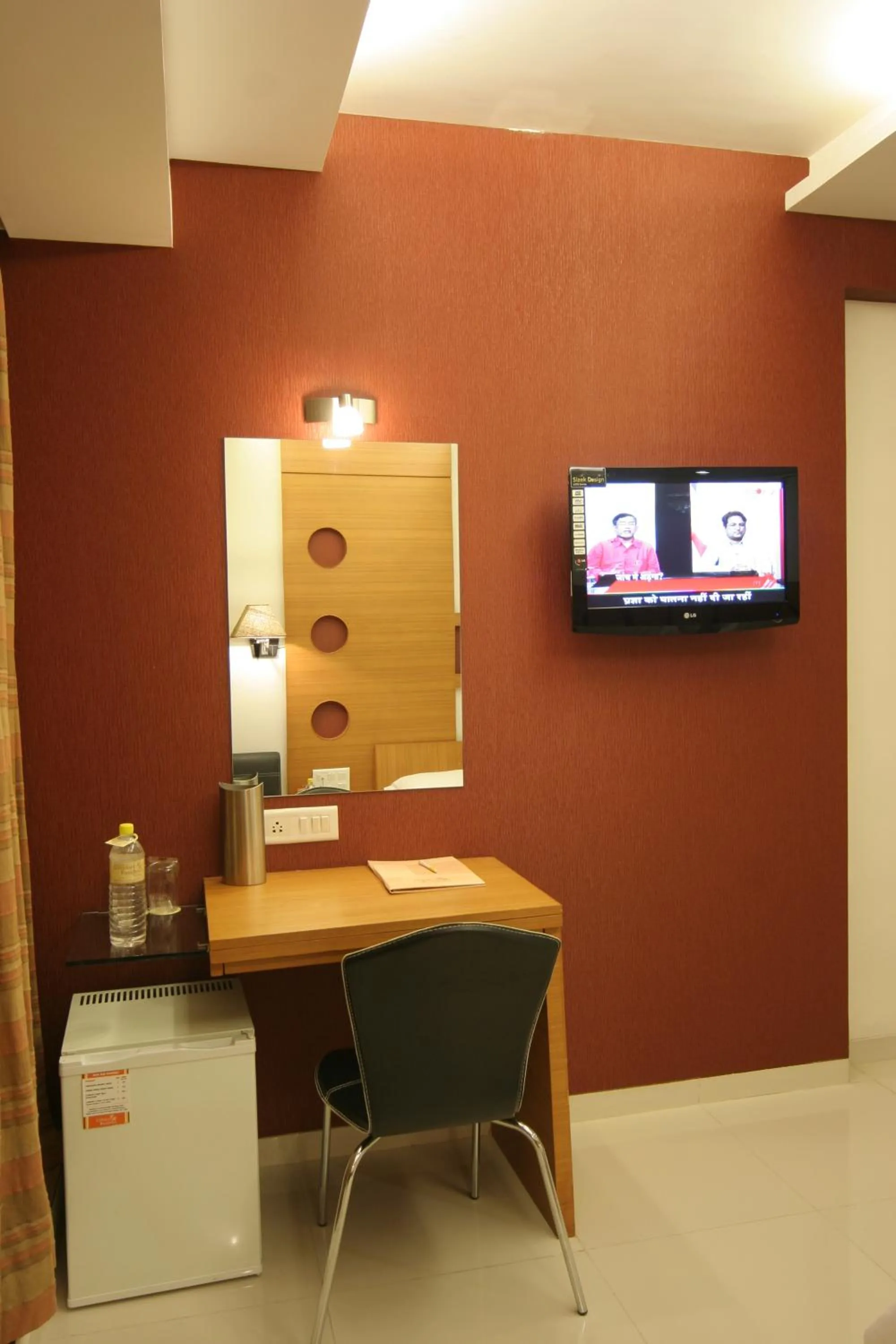 Seating area in Pride Biznotel Alkapuri Near Vadodara Airport