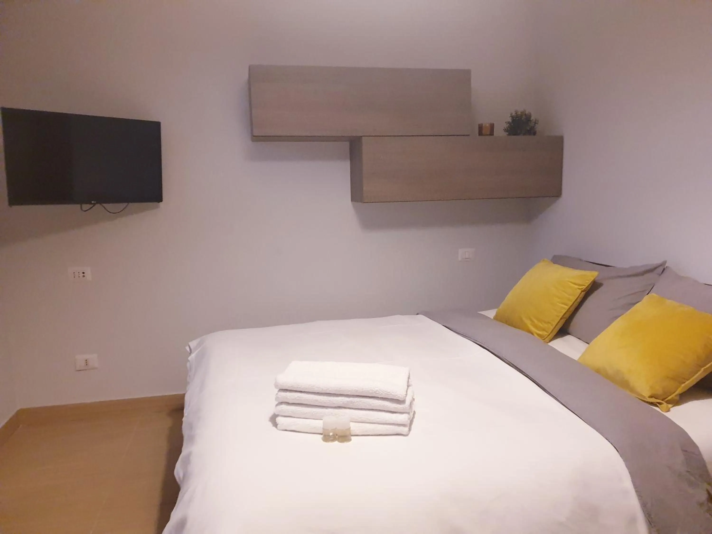 Bed in Michelangelo Apartments con parcheggio gratuito in loco e self check in
