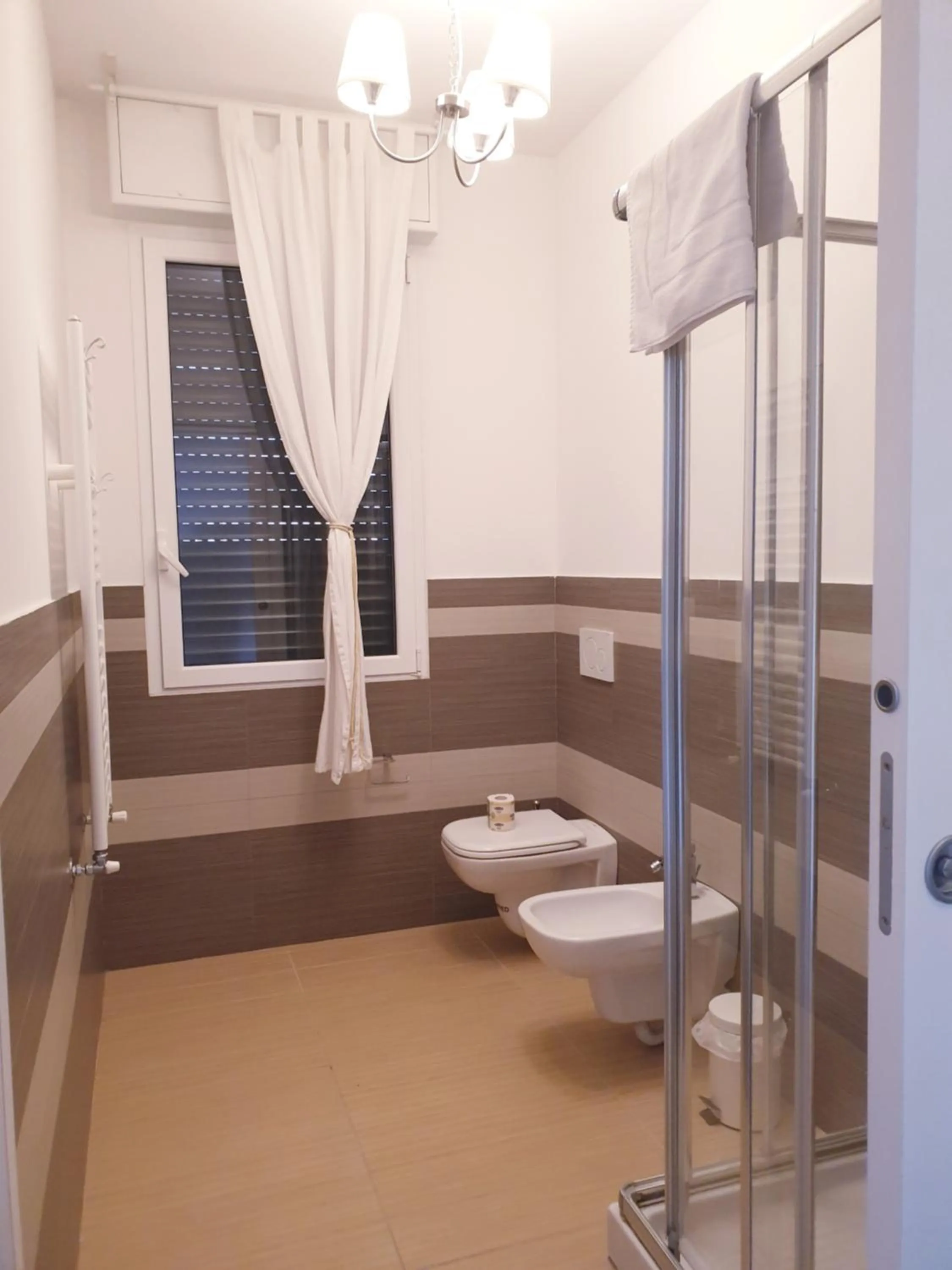 Bathroom in Michelangelo Apartments con parcheggio gratuito in loco e self check in