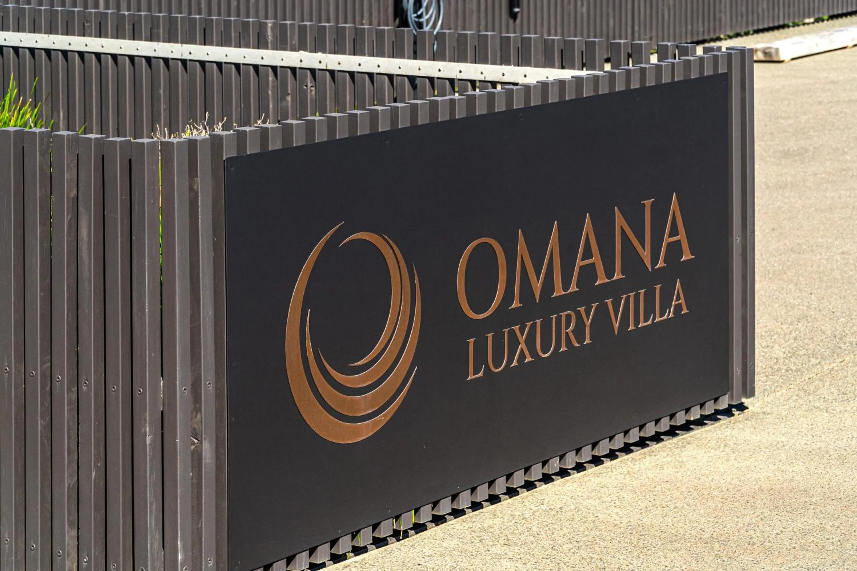Property logo or sign in Omana