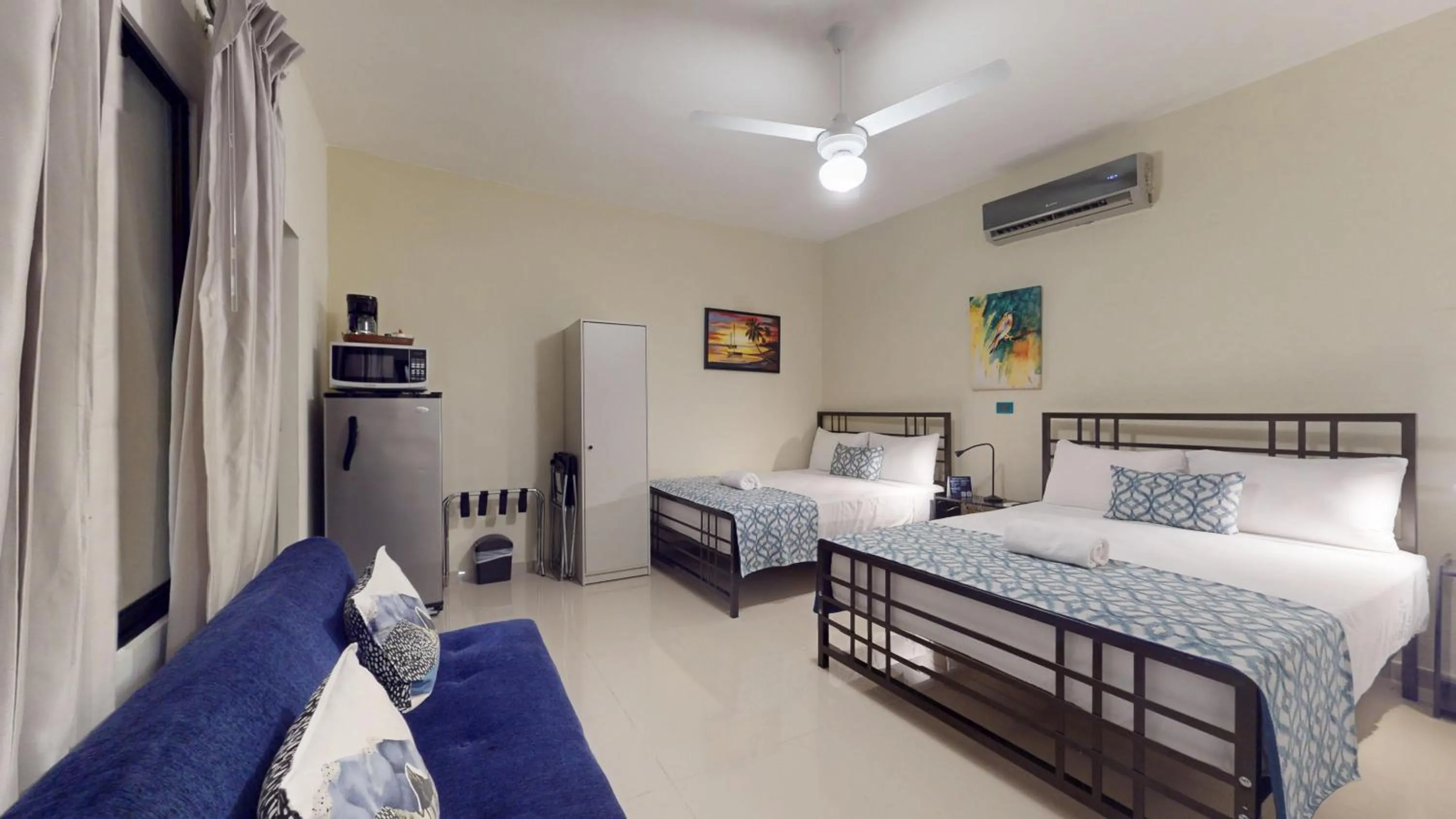 Bed in Hotel Tau Art Residence