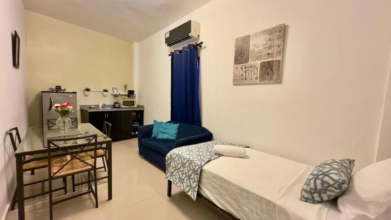 Bed in Hotel Tau Art Residence