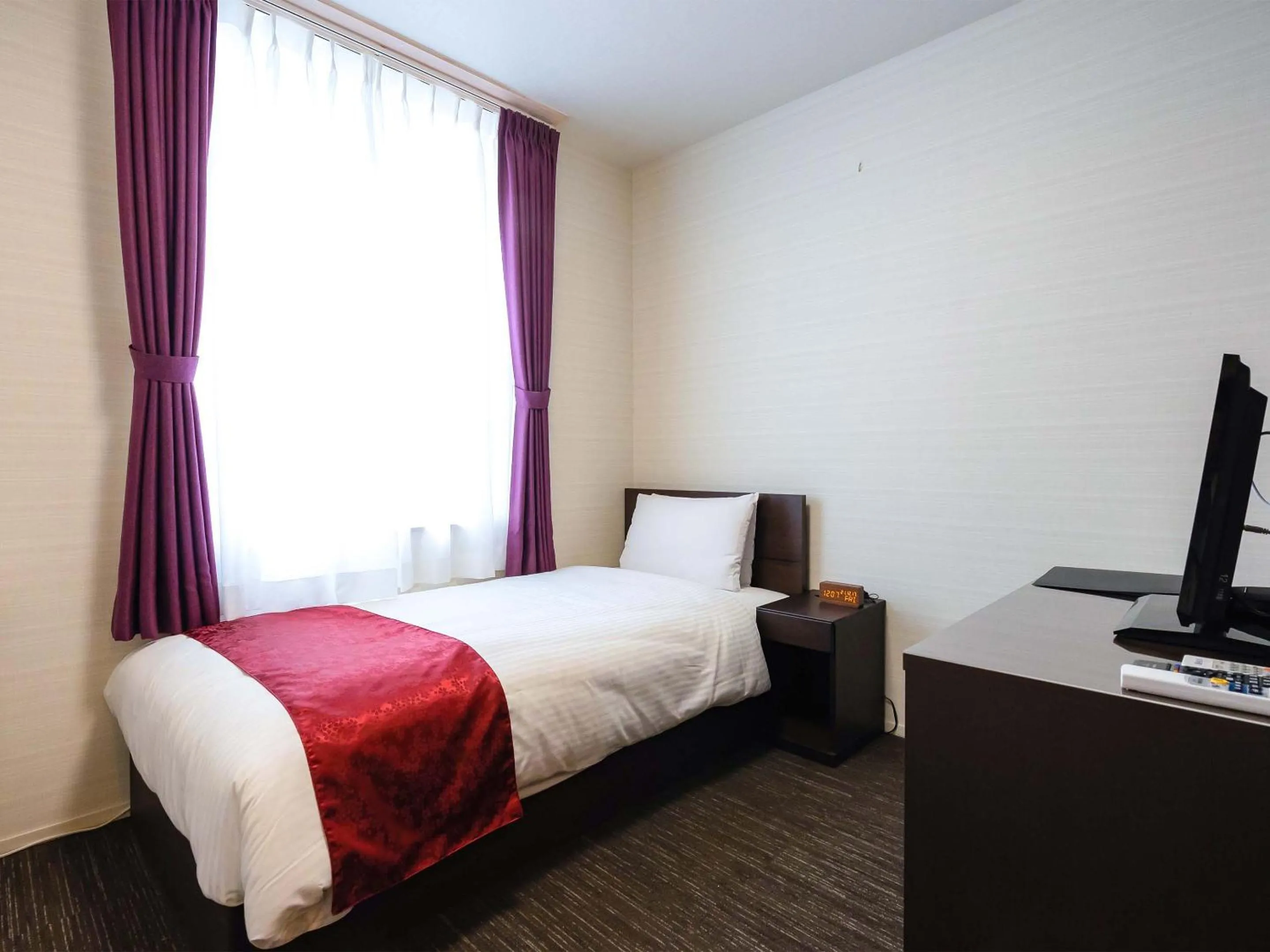 Bed in Kyoto inn Mio