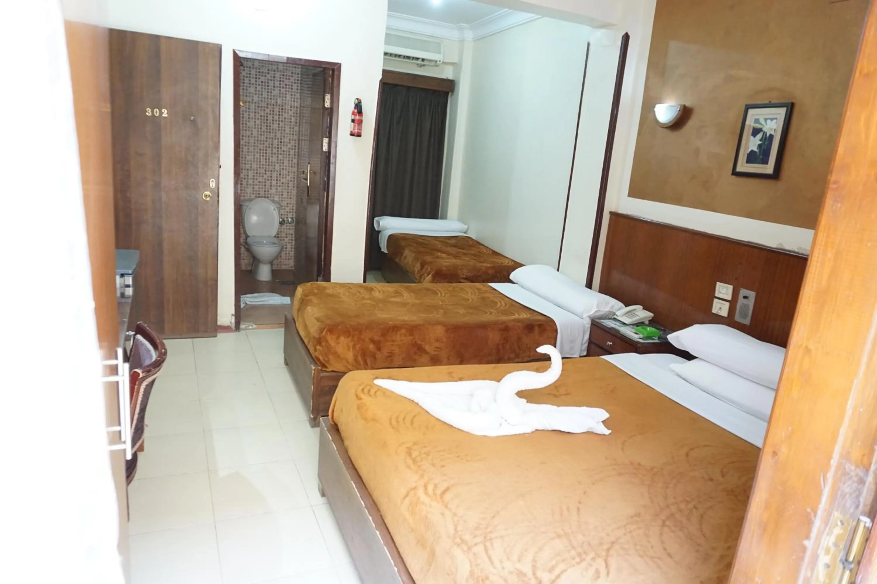 Photo of the whole room, Bed in New Saint Catherine Hotel