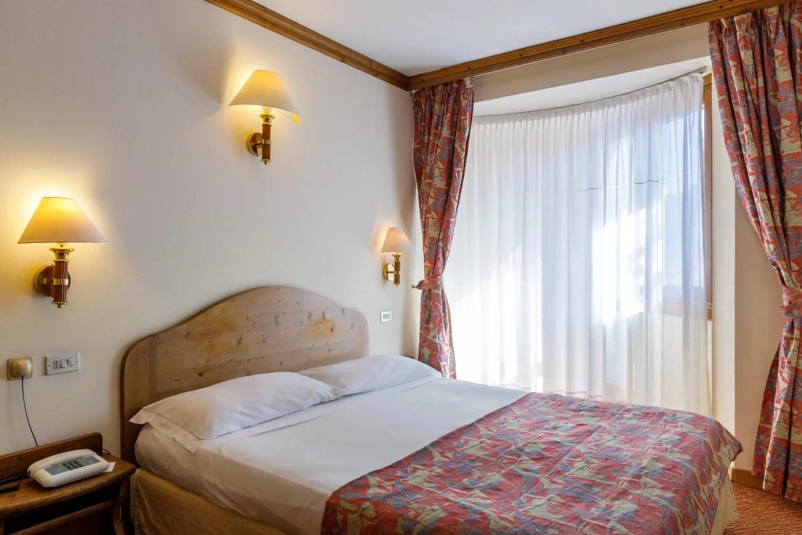 Bed in Hotel Alaska Cortina