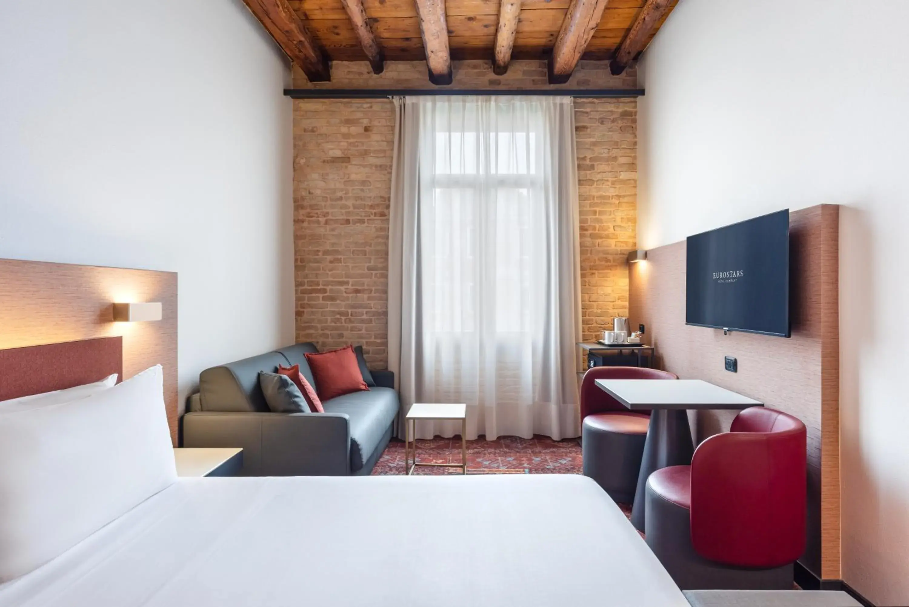 Deluxe Double or Twin Room with Canal View in Eurostars Residenza Cannaregio Deluxe Double or Twin Room with Canal View in Eurostars Residenza Cannaregio