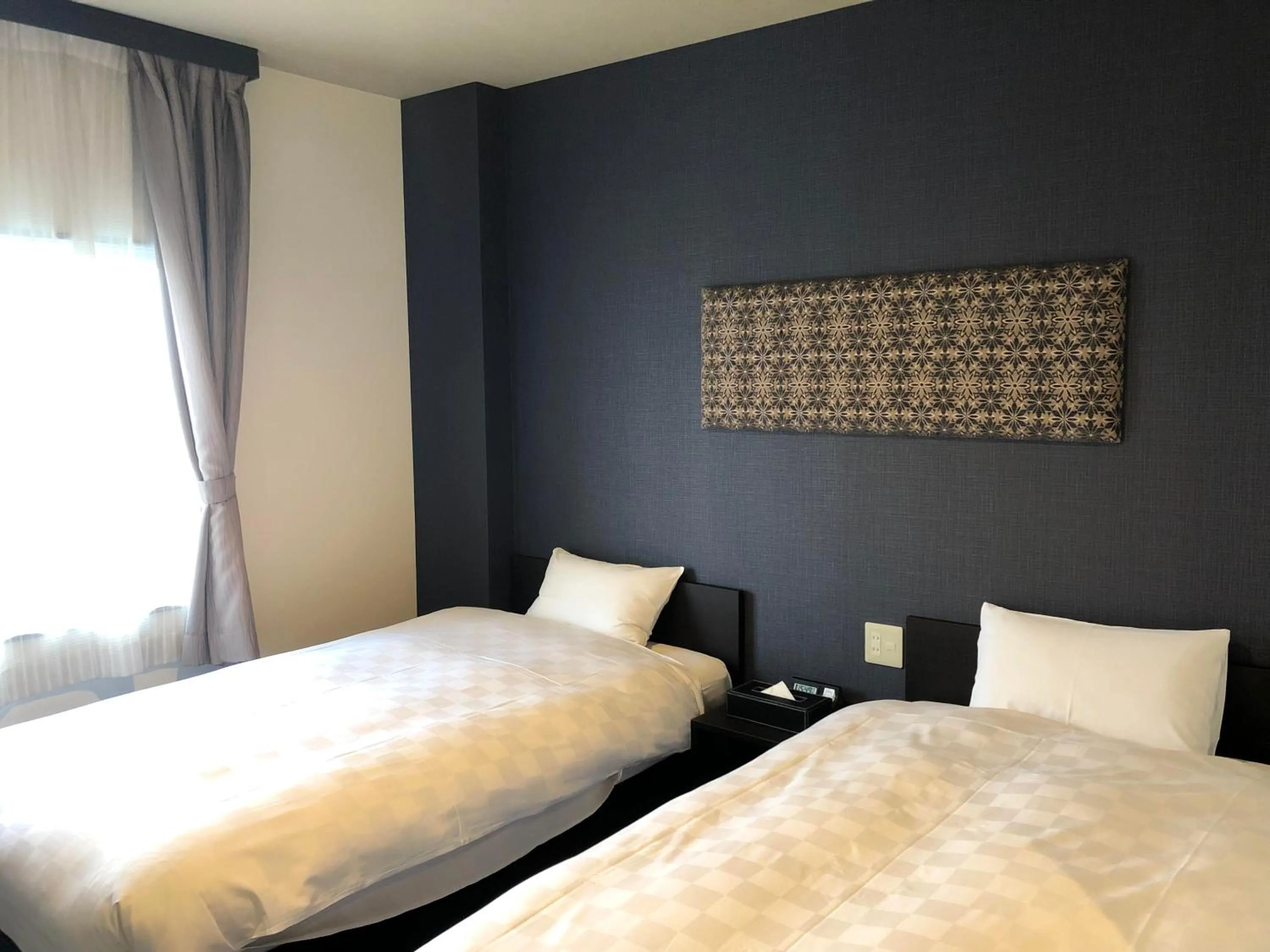 Bed in HOTEL COLLECT