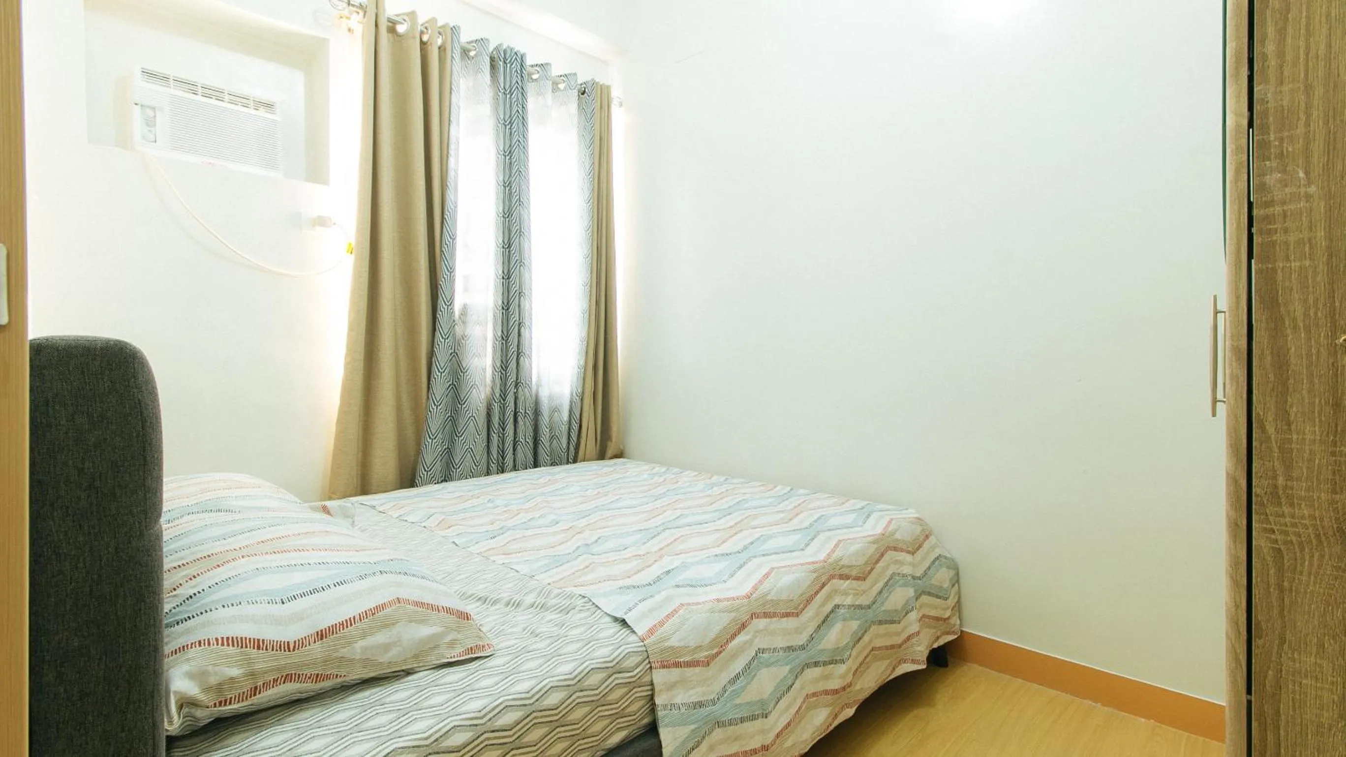 Bed in Jamah's Staycation at SMDC Trees Residences by RedDoorz