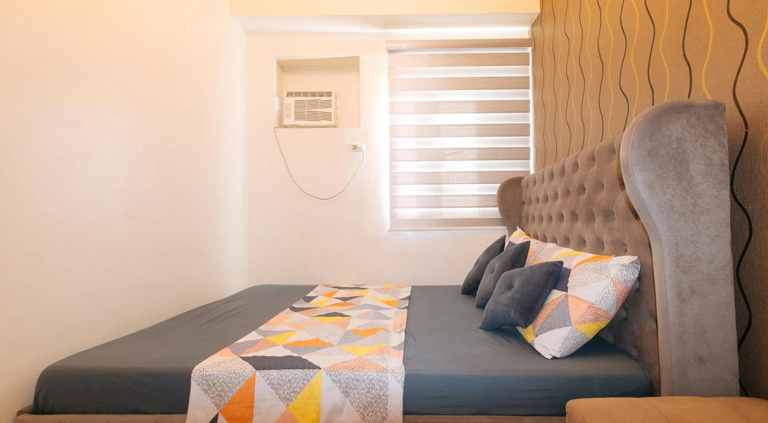 Bed in Jamah's Staycation at SMDC Trees Residences by RedDoorz
