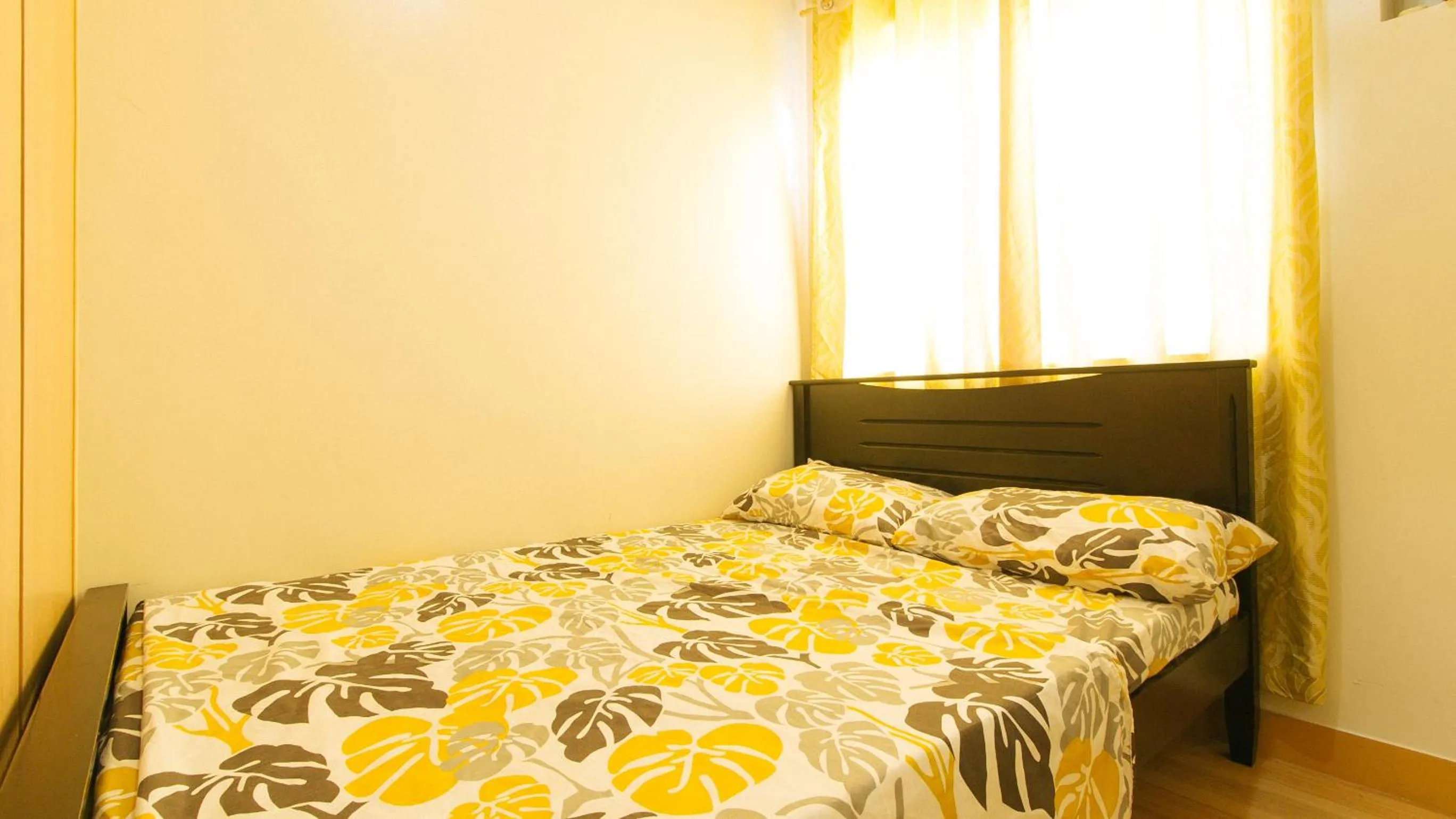 Bed in Jamah's Staycation at SMDC Trees Residences by RedDoorz