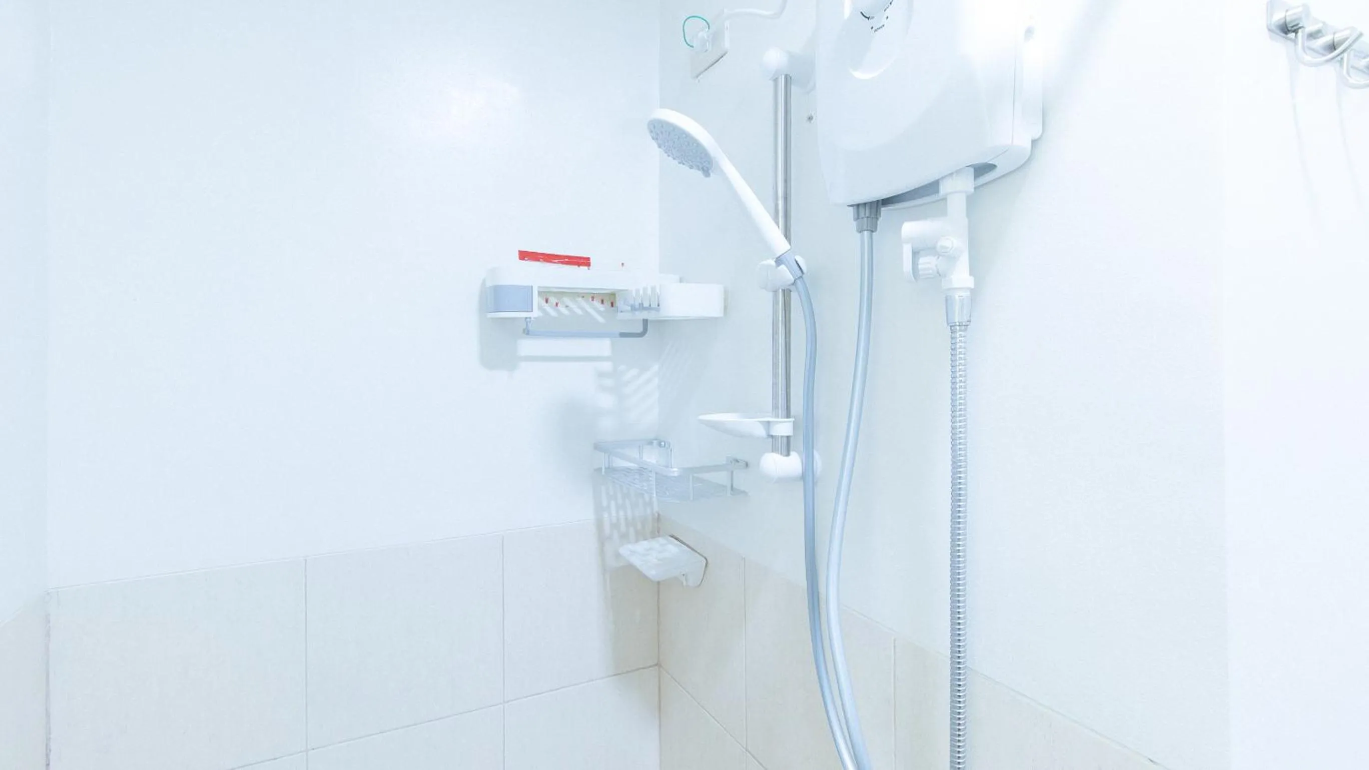 Shower in Jamah's Staycation at SMDC Trees Residences by RedDoorz